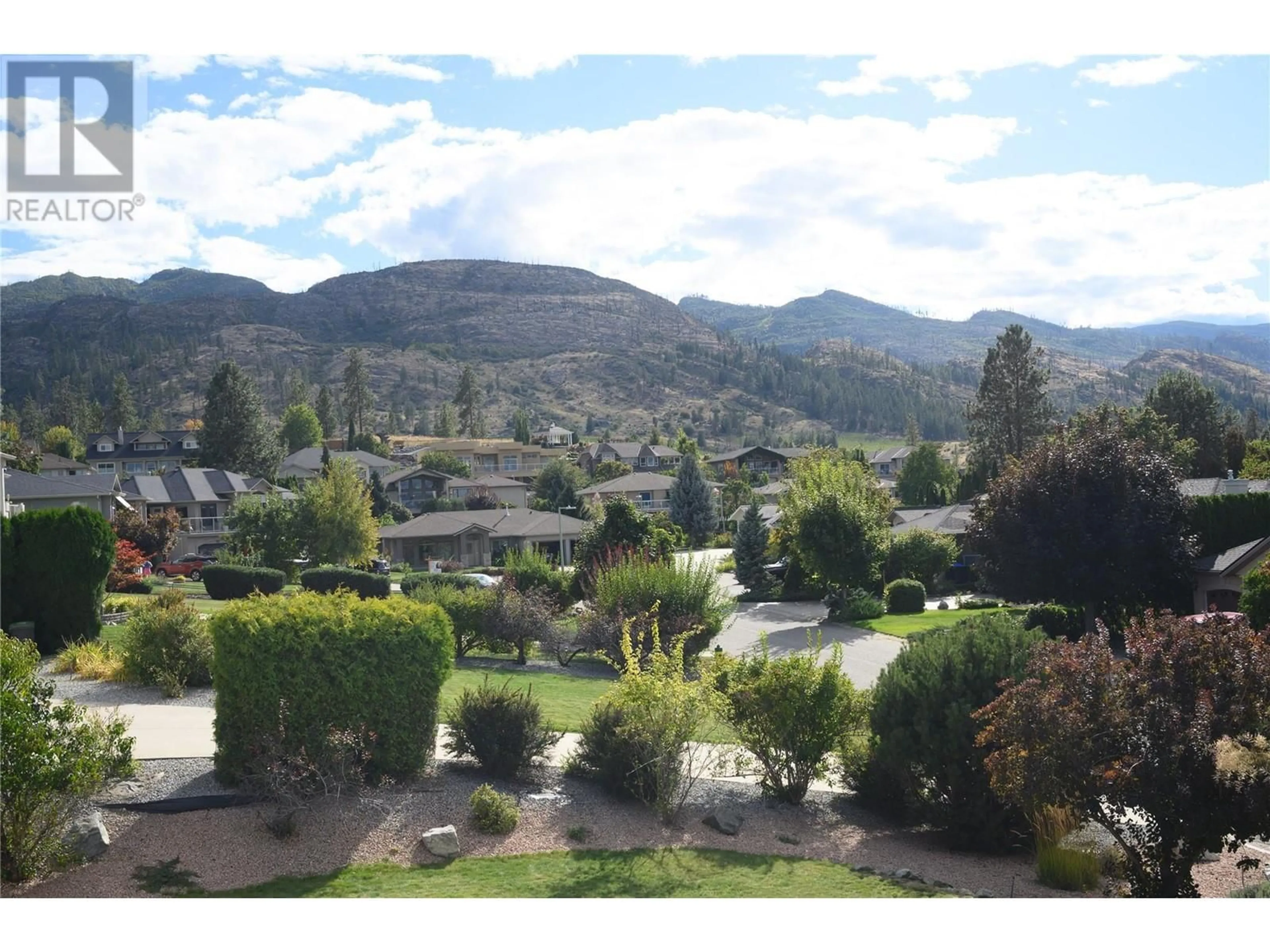 Frontside or backside of a home, the view of mountain for 307 Sandpiper Court, Kelowna British Columbia V1W4K7