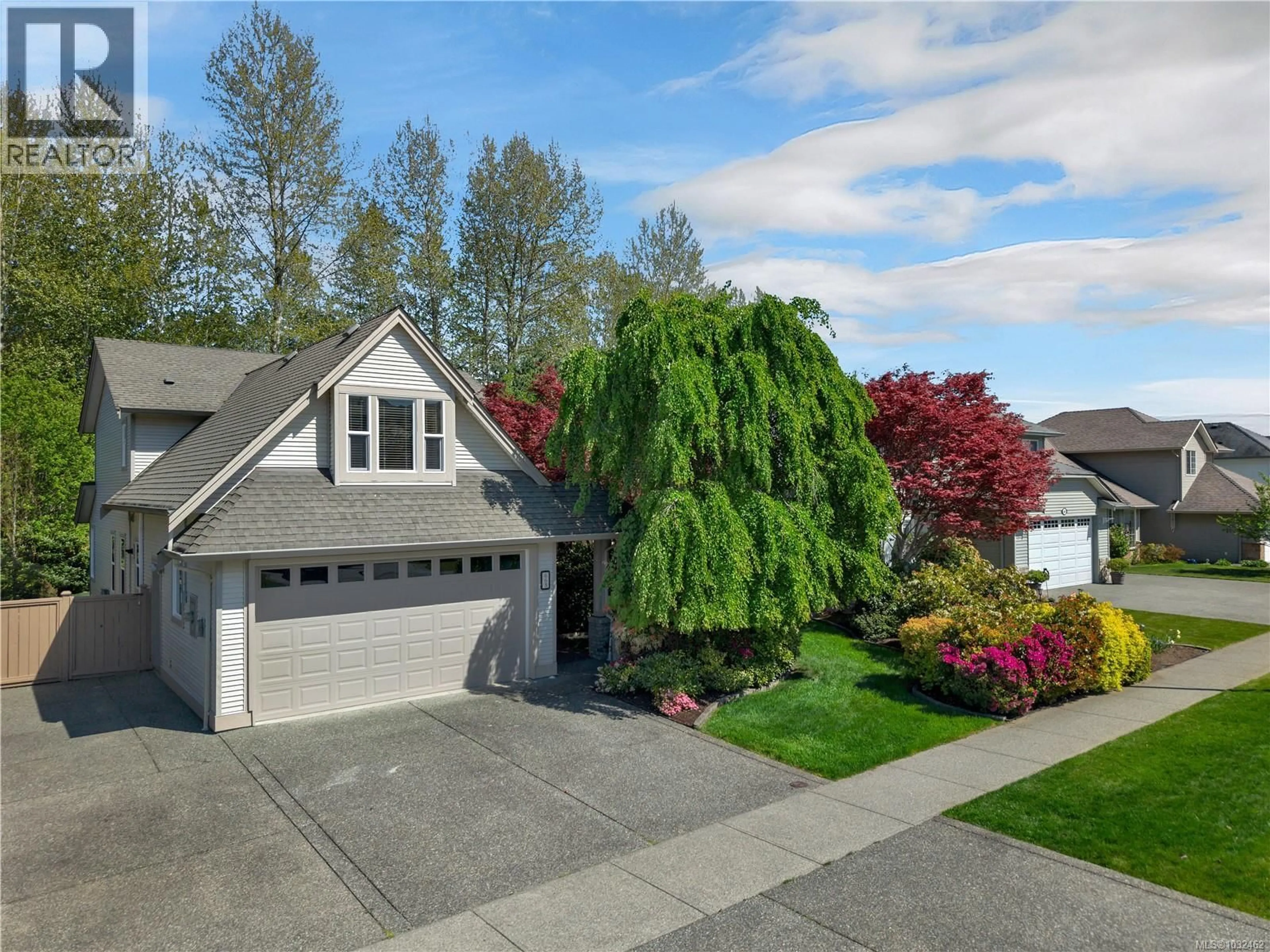 Home with vinyl exterior material, street for 668 GARDEN WAY, Campbell River British Columbia V9H2R6