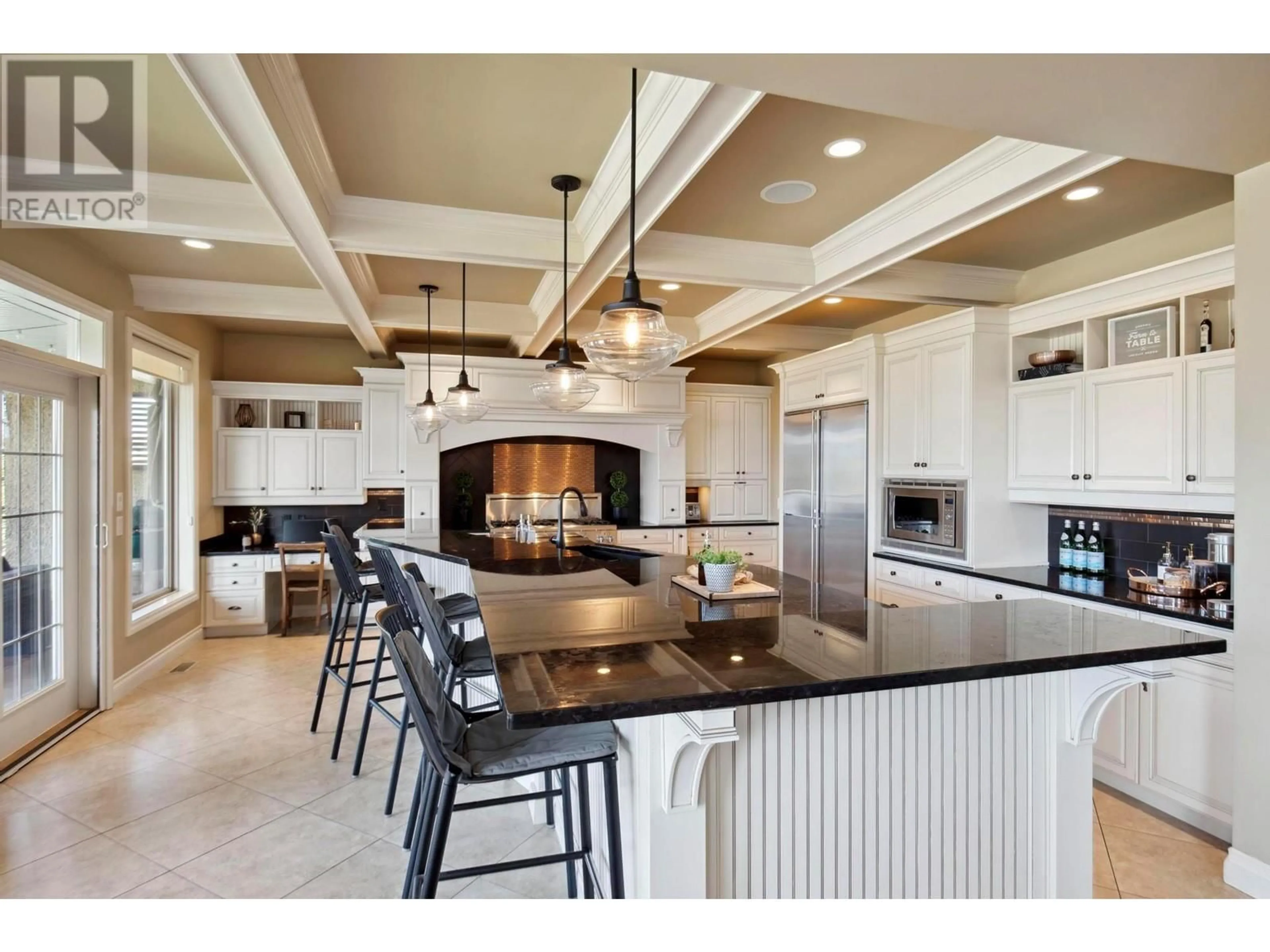 Open concept kitchen for 369 Farron Court, Kelowna British Columbia V1W5H2