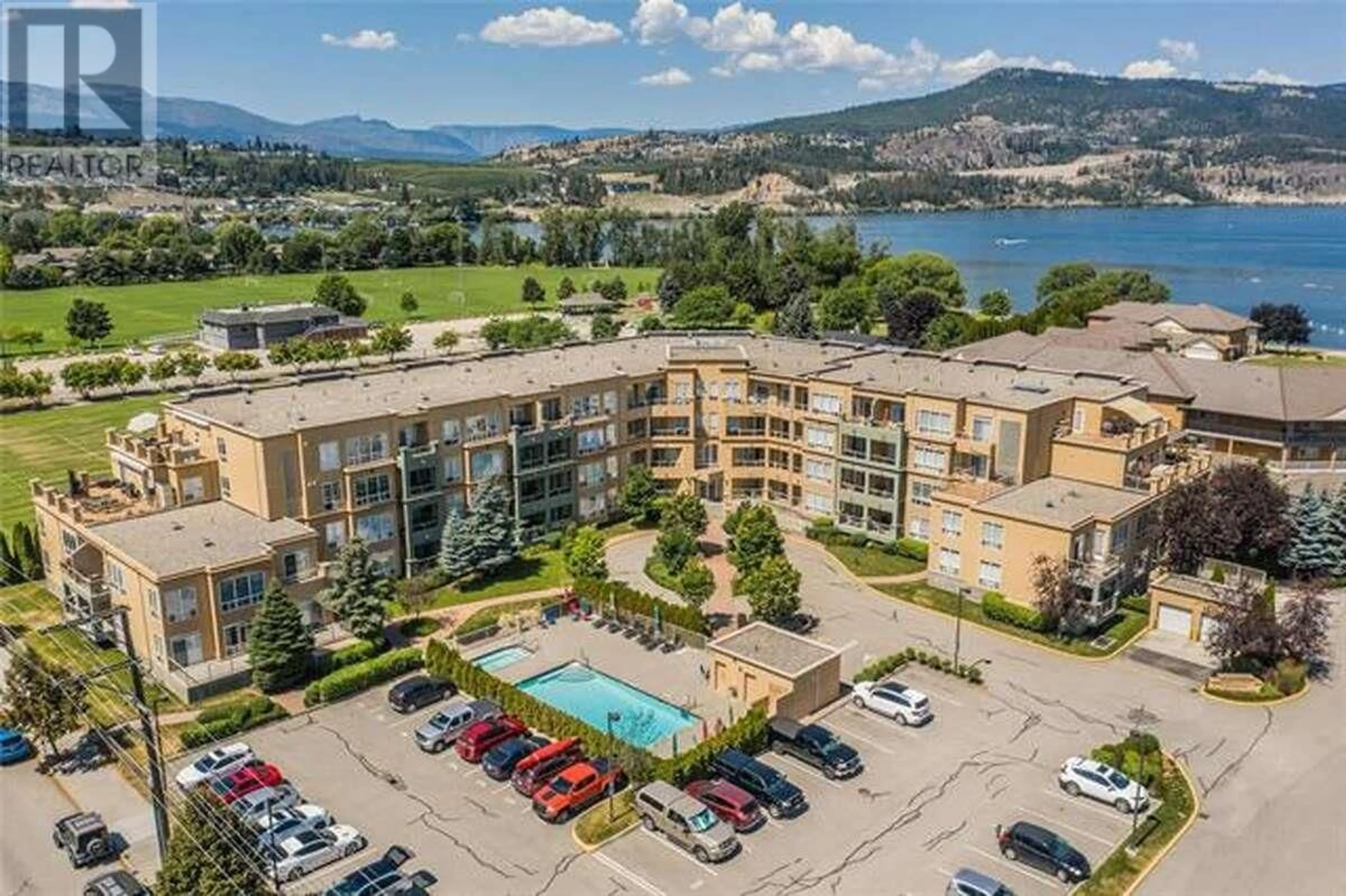 A pic from outside/outdoor area/front of a property/back of a property/a pic from drone, water/lake/river/ocean view for 304 - 3550 WOODSDALE ROAD, Lake Country British Columbia V4V2P5