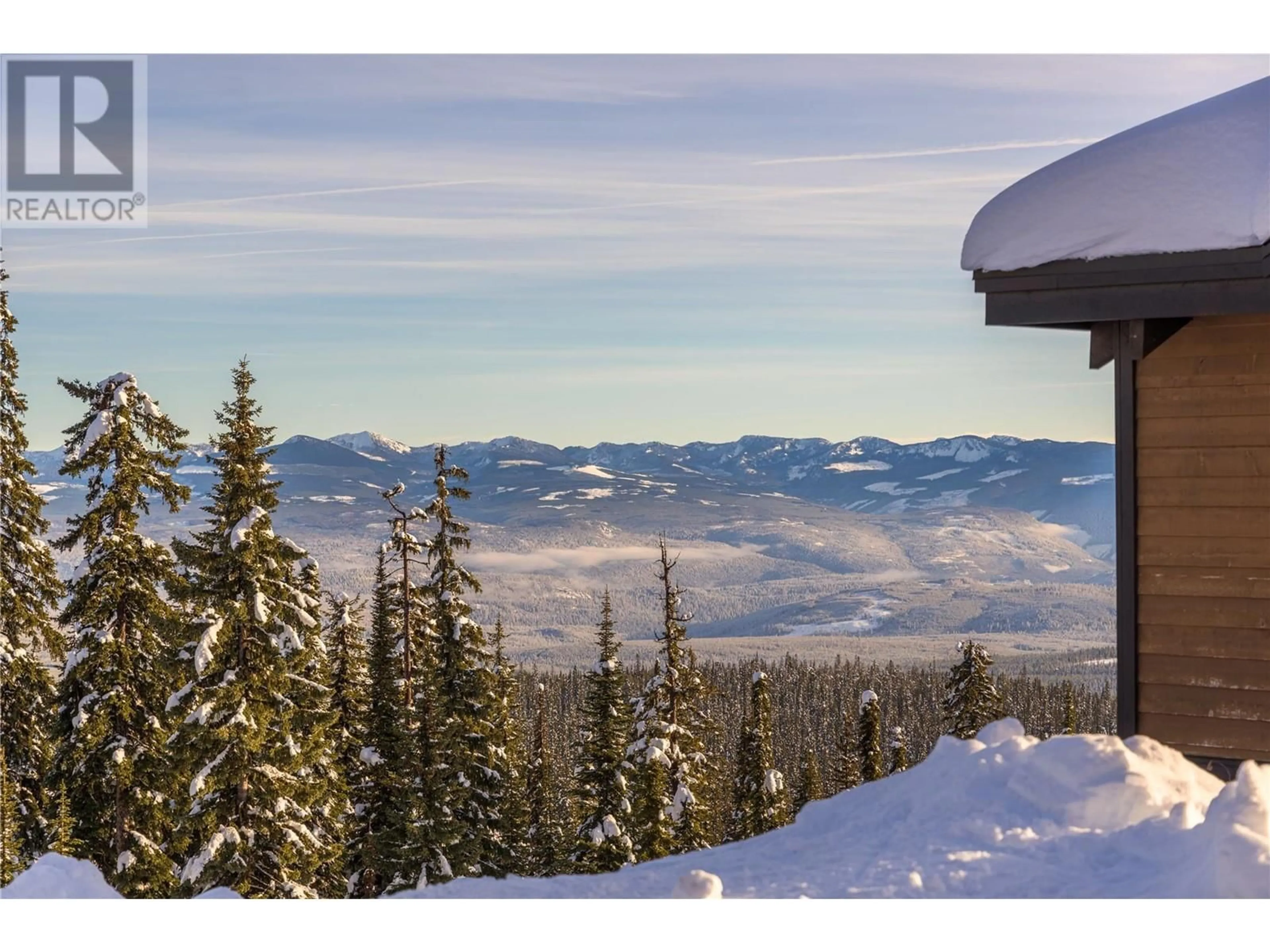 A pic from outside/outdoor area/front of a property/back of a property/a pic from drone, mountain view for 620 FEATHERTOP WAY, Big White British Columbia V1P1P3