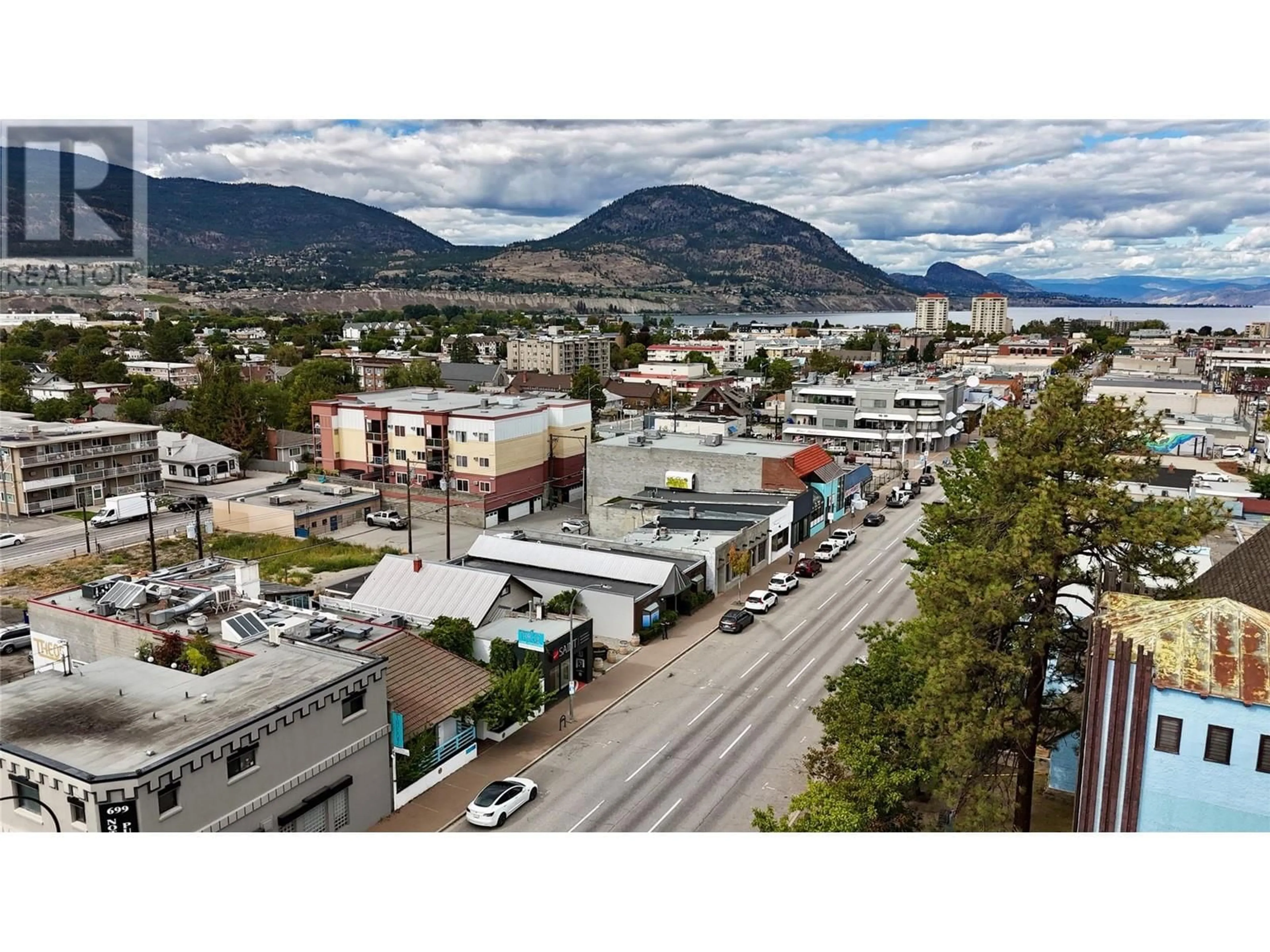 A pic from outside/outdoor area/front of a property/back of a property/a pic from drone, mountain view for 681 Main Street, Penticton British Columbia V2A5C9