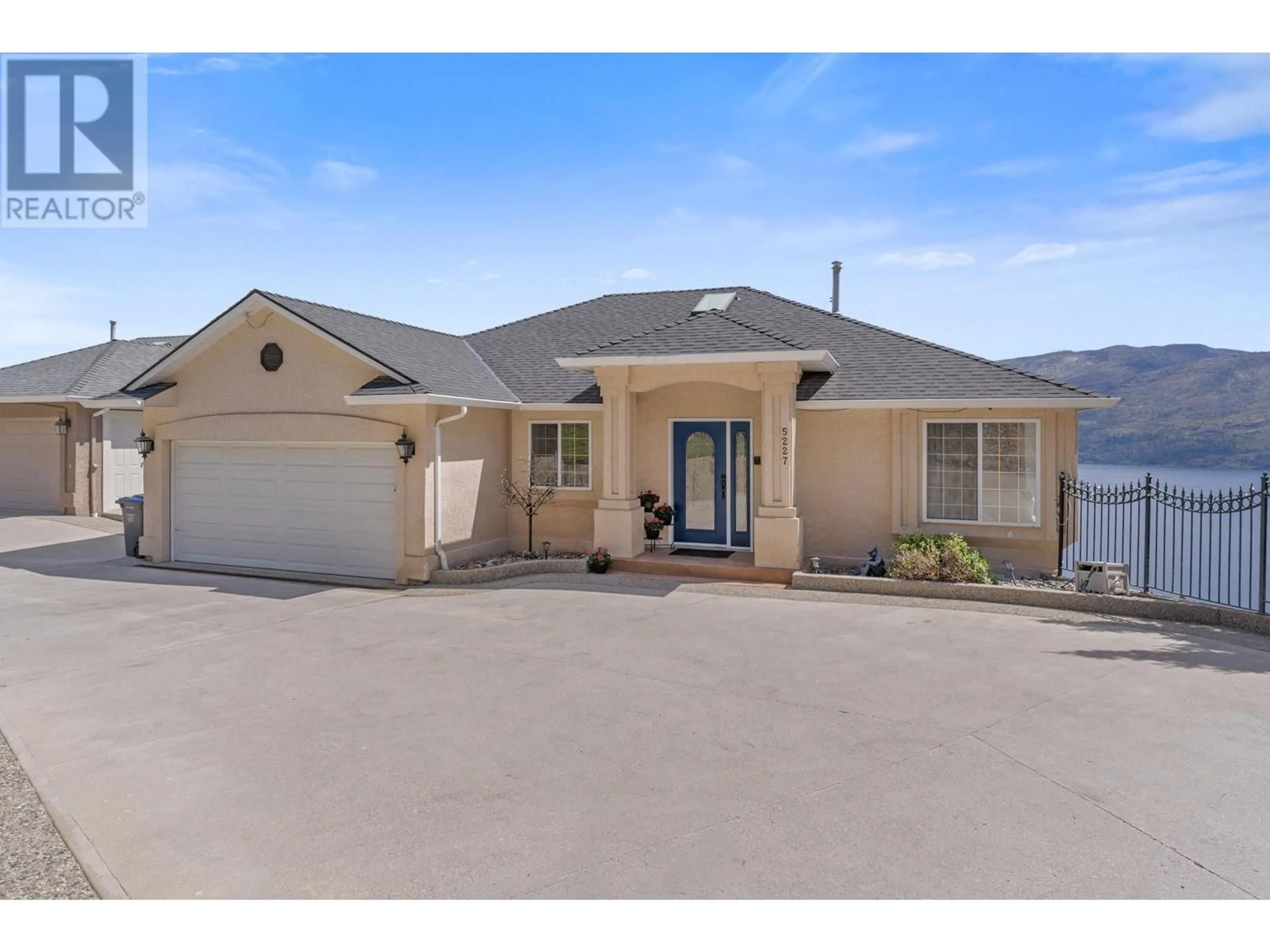 Frontside or backside of a home, the street view for 5227 Trepanier Bench Road, Peachland British Columbia V0H1X2