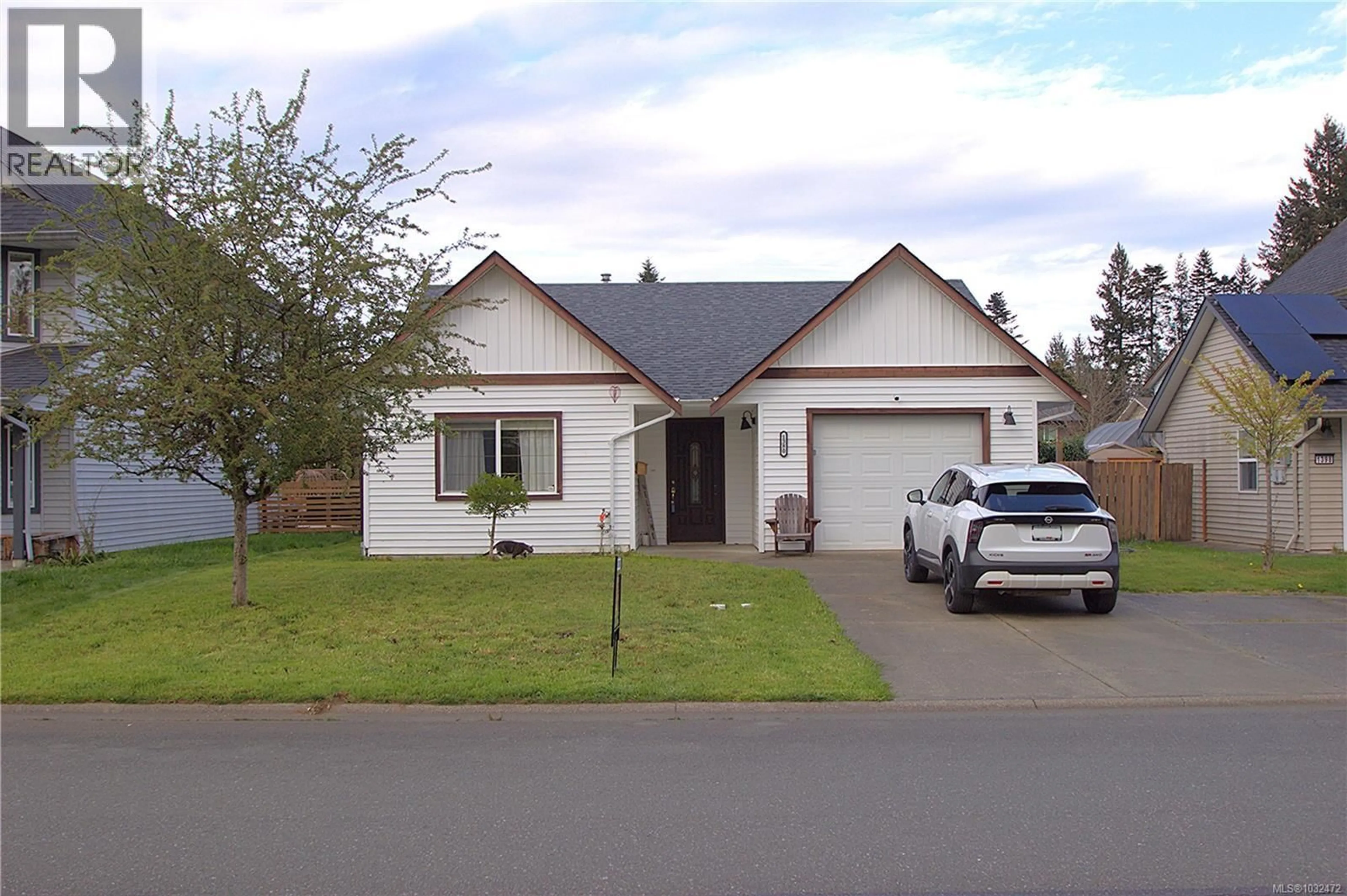Home with vinyl exterior material, street for 1380 KREBS CRESCENT, Courtenay British Columbia V9N9E9