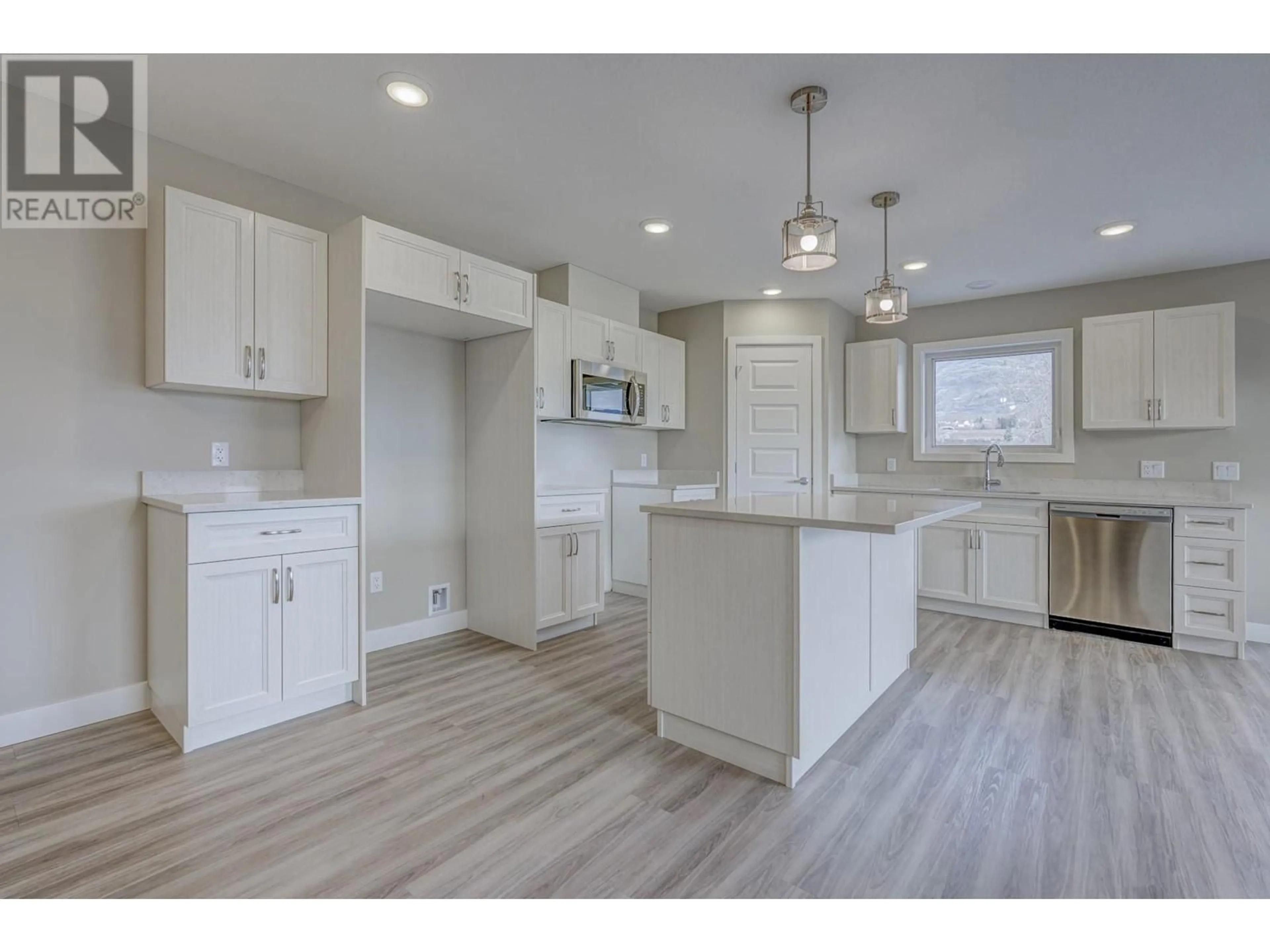 Open concept kitchen for 5620 51st Street Unit# 304, Osoyoos British Columbia V0H1V6