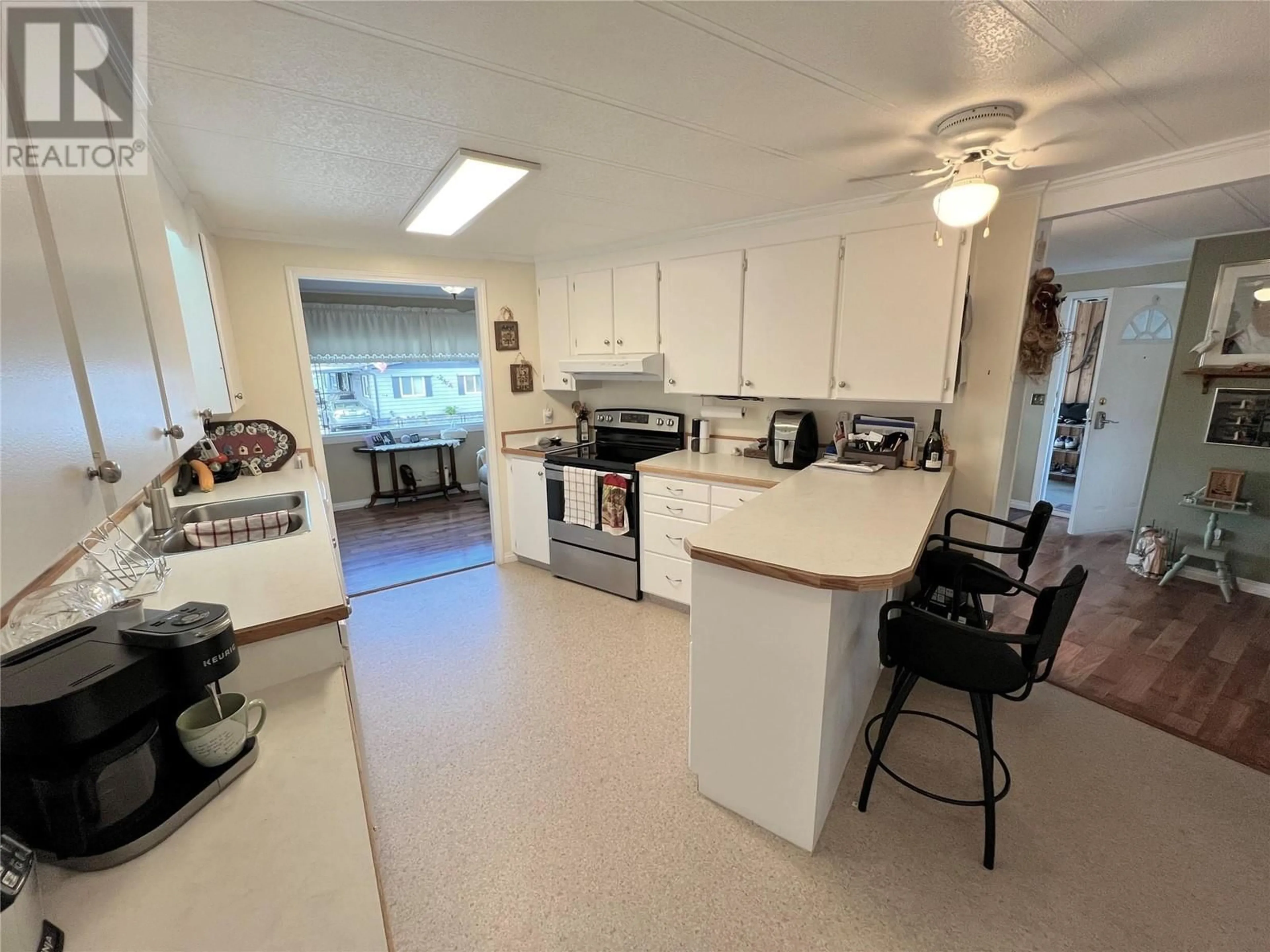 Kitchen, wood floors, cottage for 6601 TUCELNUIT Drive Unit# 115, Oliver British Columbia V0H1T3