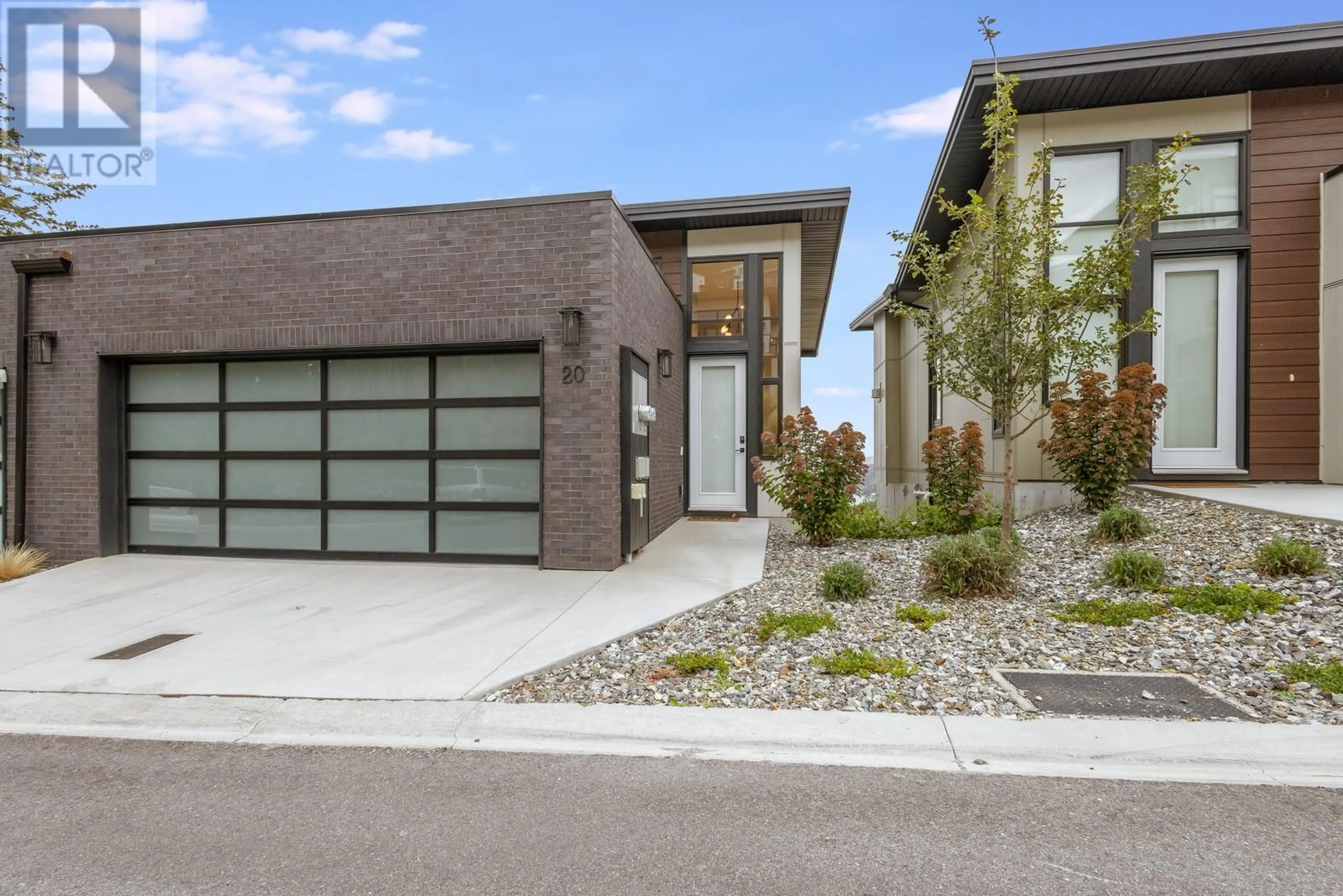 Home with brick exterior material for 3220 Hilltown Drive Unit# 20, Kelowna British Columbia V1V0C6