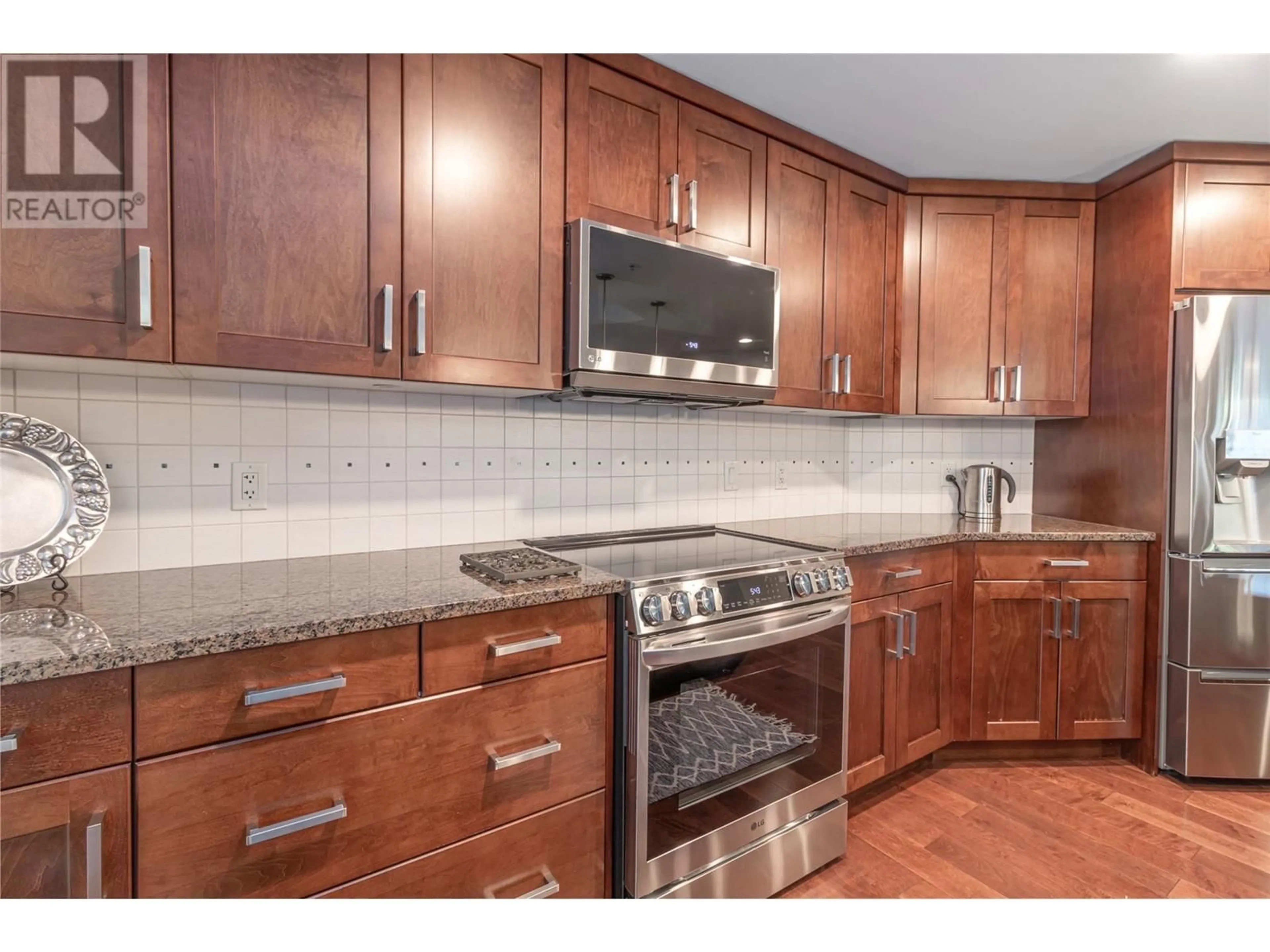 Standard kitchen, wood floors for 580 Sarsons Road Unit# 112 Lot# S/L 55, Kelowna British Columbia V1W5H5