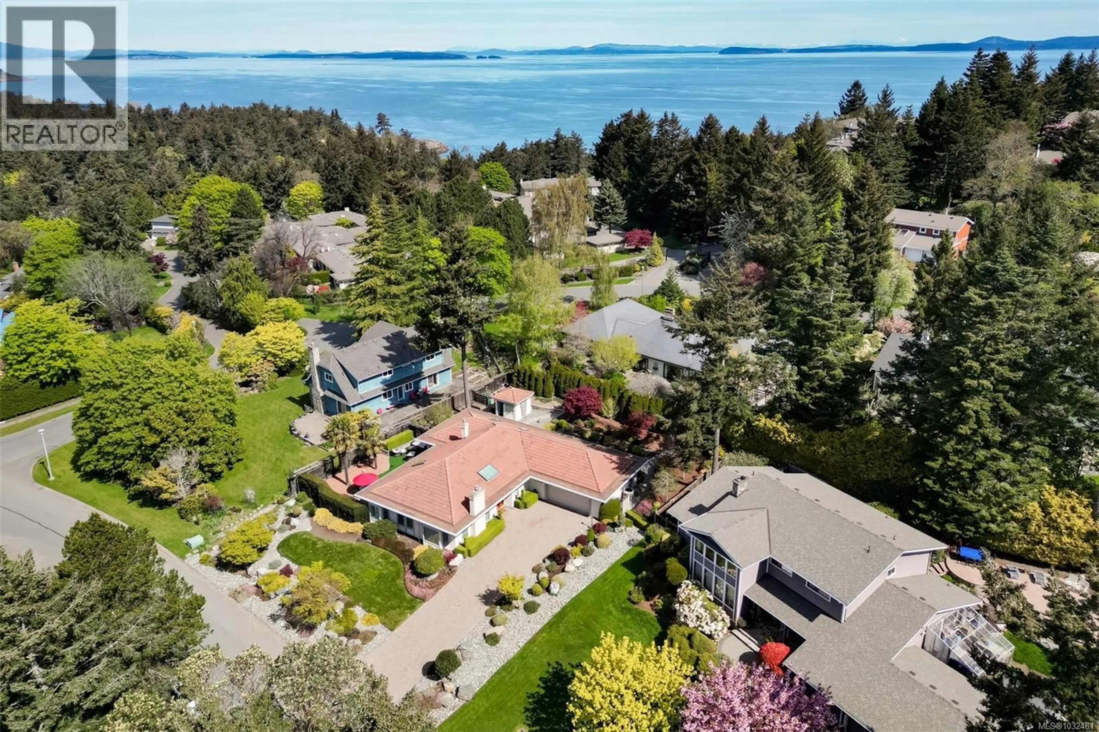 A pic from outside/outdoor area/front of a property/back of a property/a pic from drone, water/lake/river/ocean view for 2770 ARBUTUS ROAD, Saanich British Columbia V8N5X4