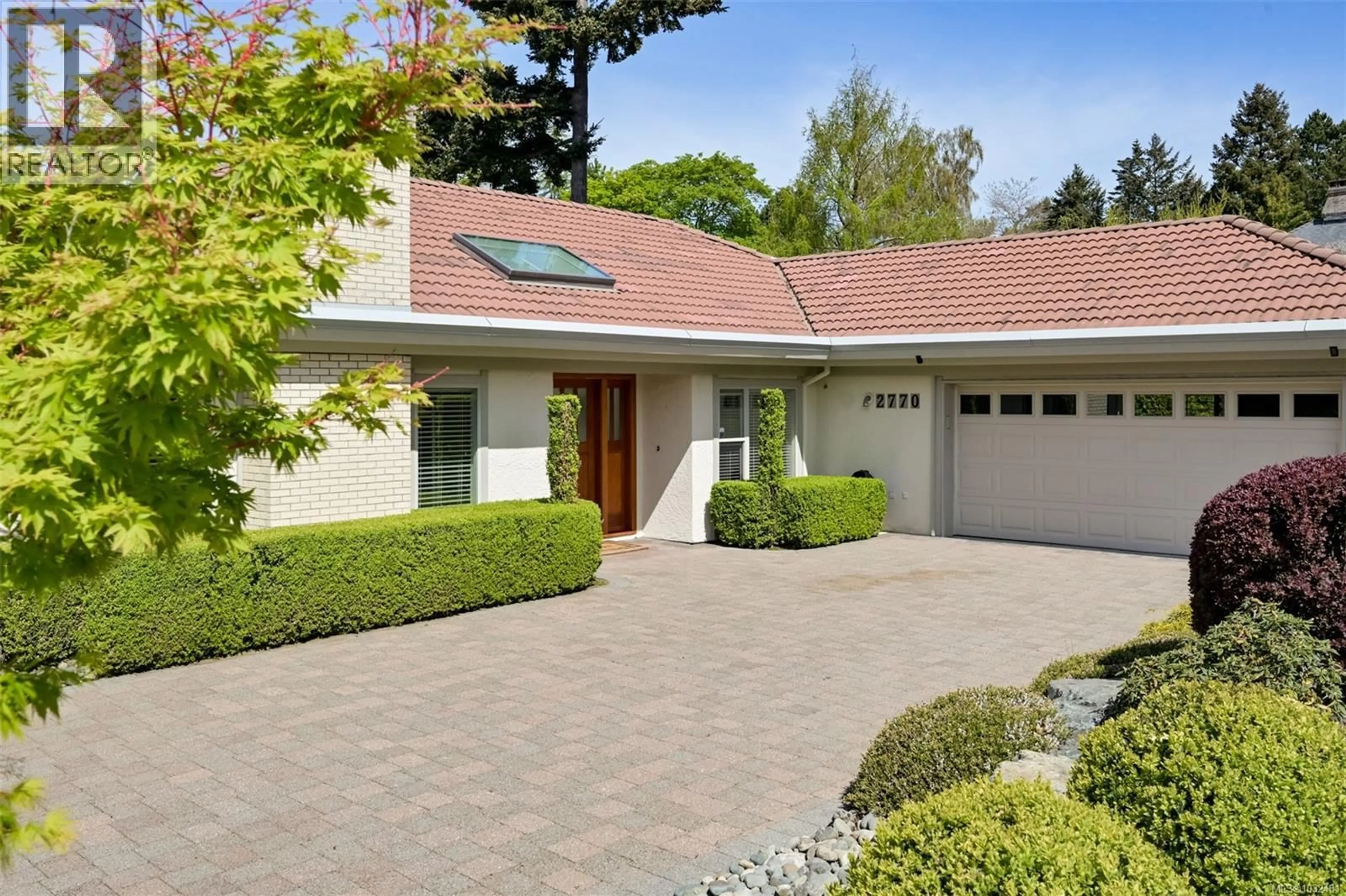 Home with brick exterior material, street for 2770 ARBUTUS ROAD, Saanich British Columbia V8N5X4