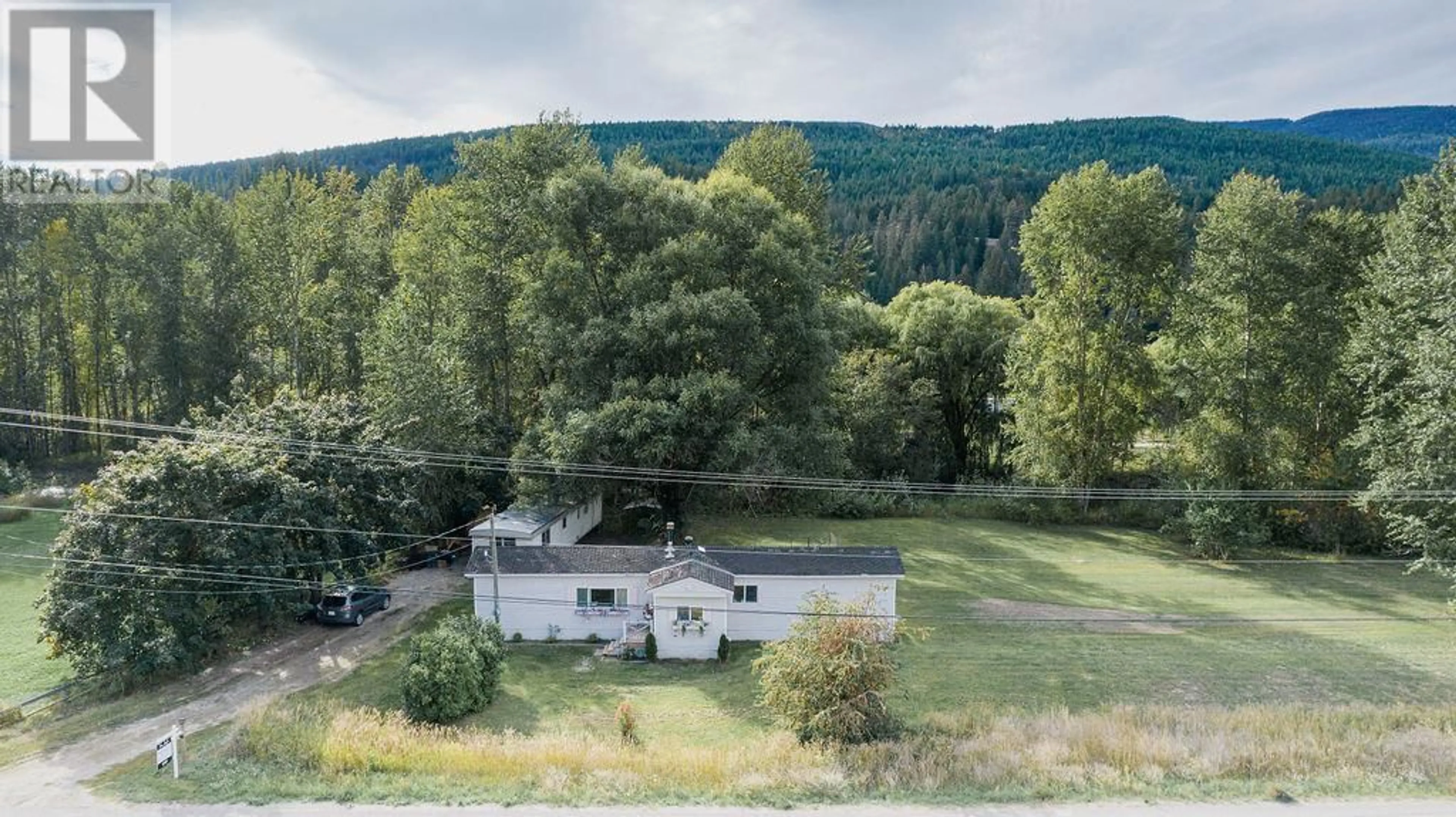 A pic from exterior of the house or condo, cottage for 1404 Salmon River Road, Salmon Arm British Columbia V1E3H4