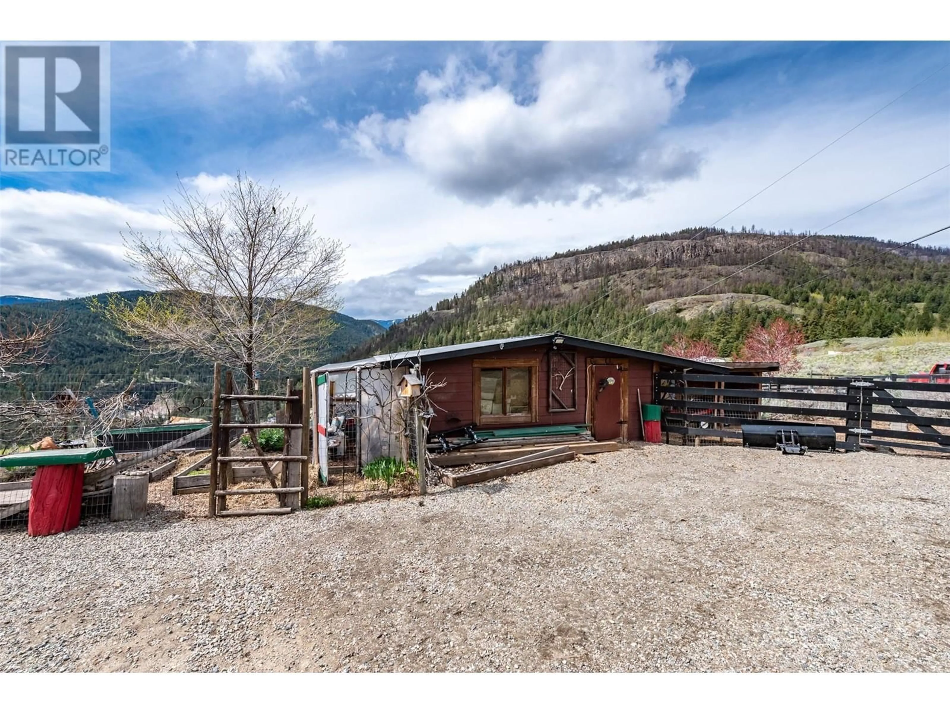 A pic from outside/outdoor area/front of a property/back of a property/a pic from drone, mountain view for 795 SHEEP CREEK ROAD, Keremeos British Columbia V0K1K0