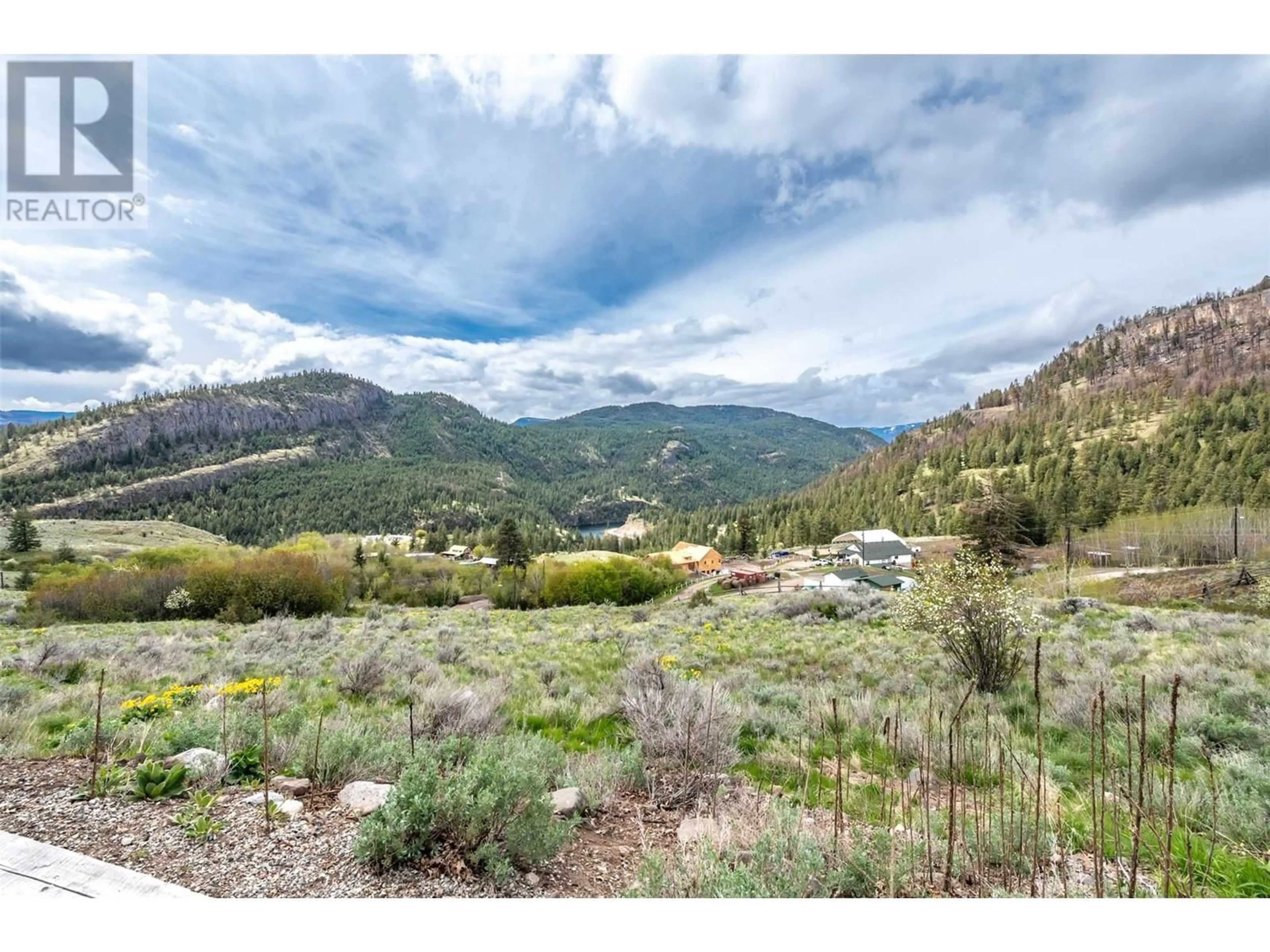 A pic from outside/outdoor area/front of a property/back of a property/a pic from drone, mountain view for 795 SHEEP CREEK ROAD, Keremeos British Columbia V0K1K0