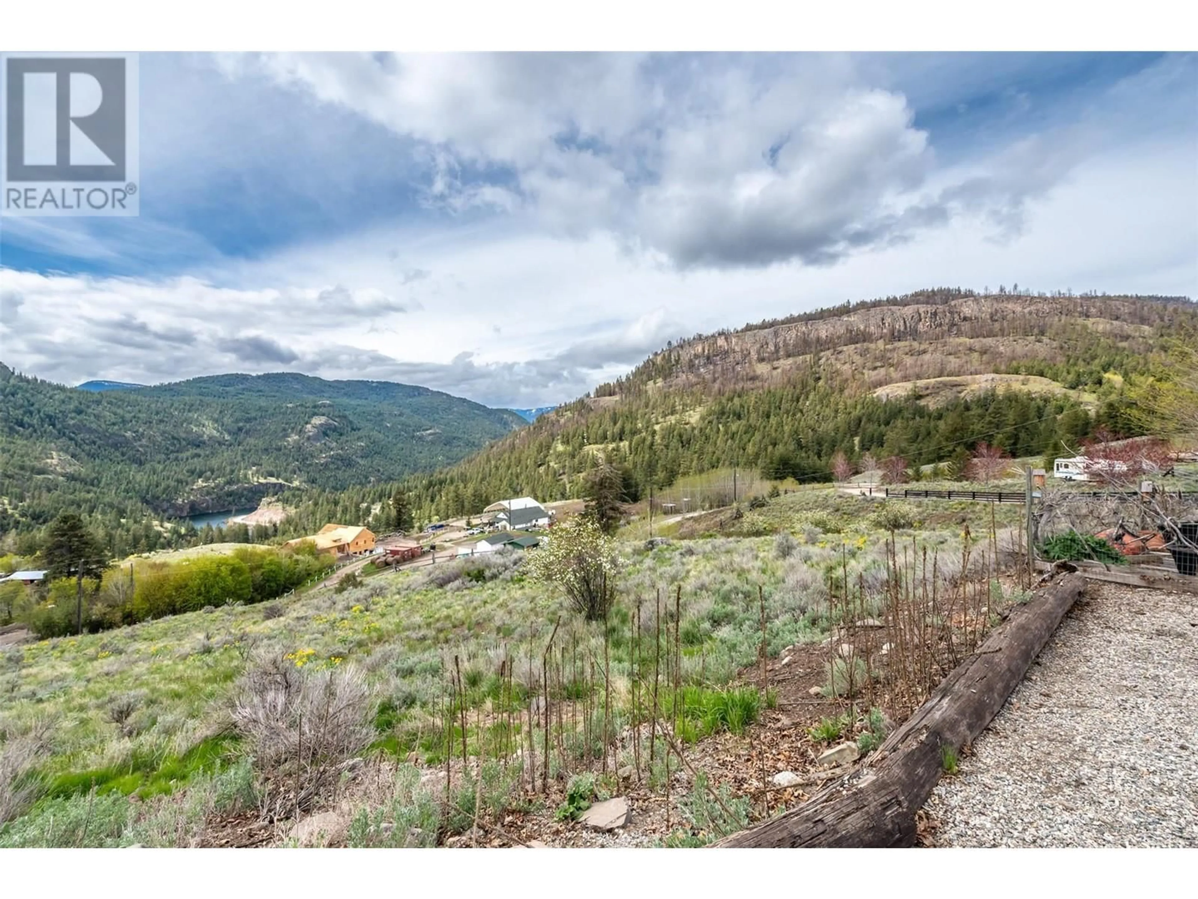 A pic from outside/outdoor area/front of a property/back of a property/a pic from drone, mountain view for 795 SHEEP CREEK ROAD, Keremeos British Columbia V0K1K0