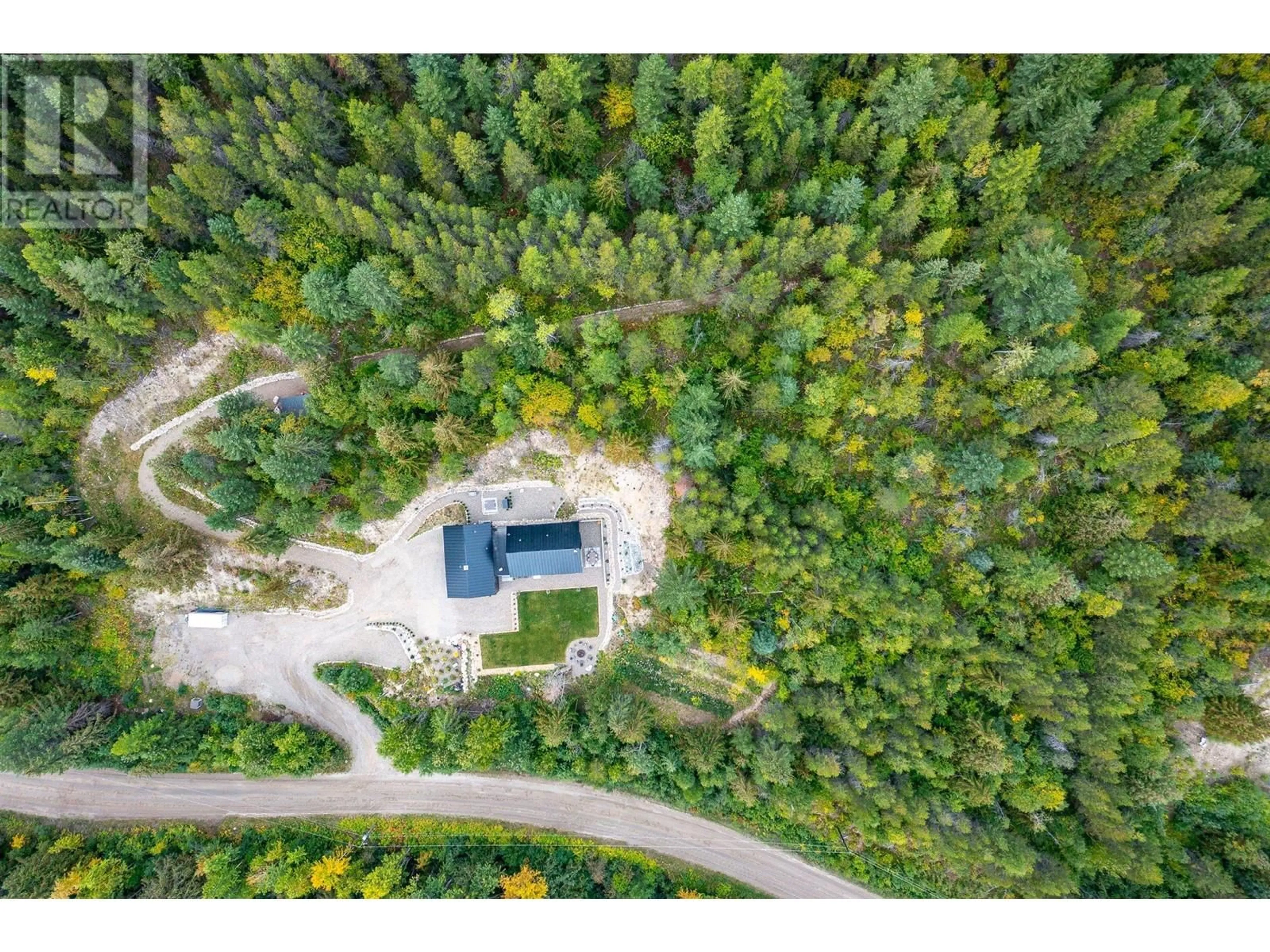 A pic from outside/outdoor area/front of a property/back of a property/a pic from drone, forest/trees view for 8725 FORSBERG ROAD, Vernon British Columbia V1B3M6