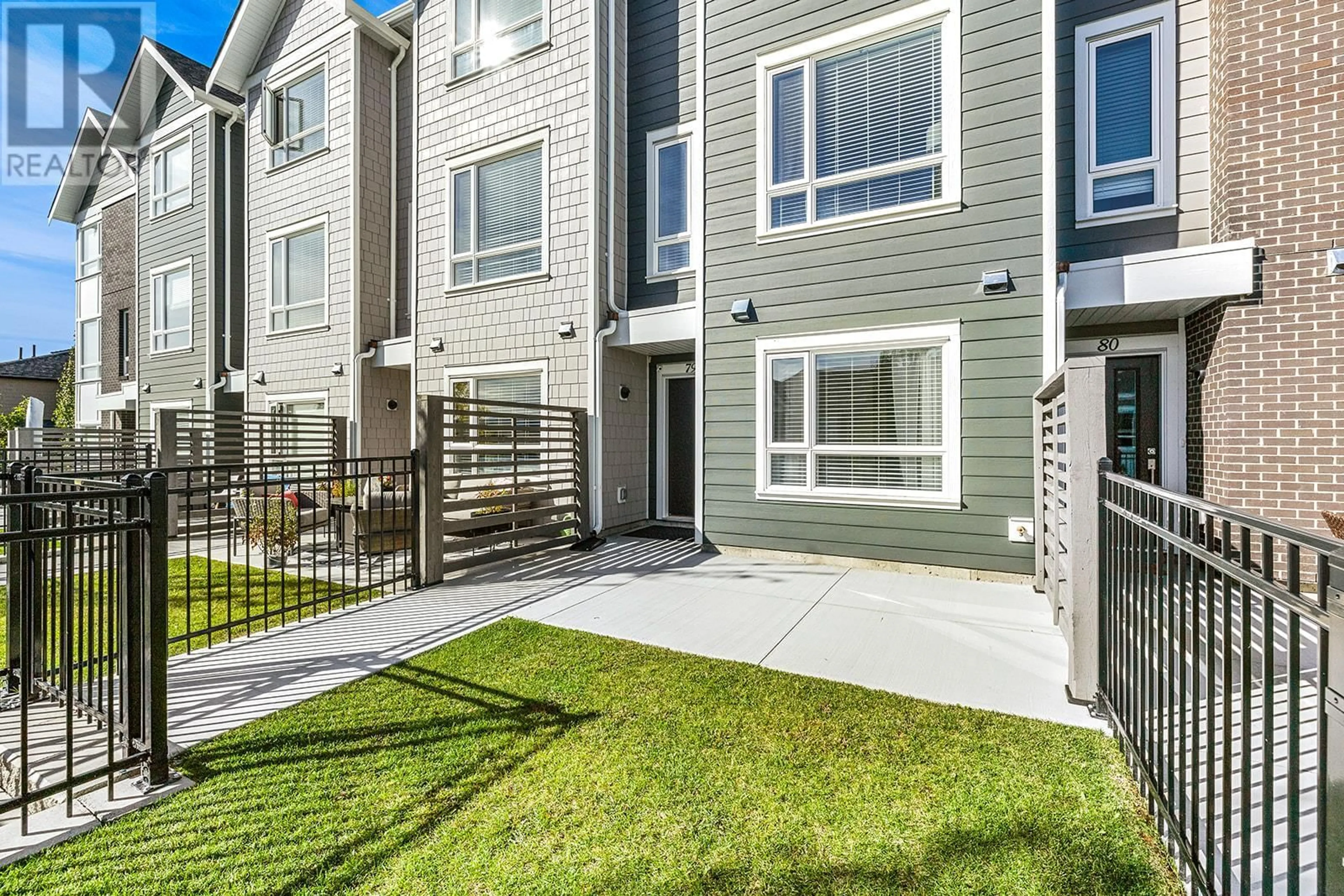 A pic from exterior of the house or condo, the fenced backyard for 13098 Shoreline Way Unit# 79, Lake Country British Columbia V4A0A8