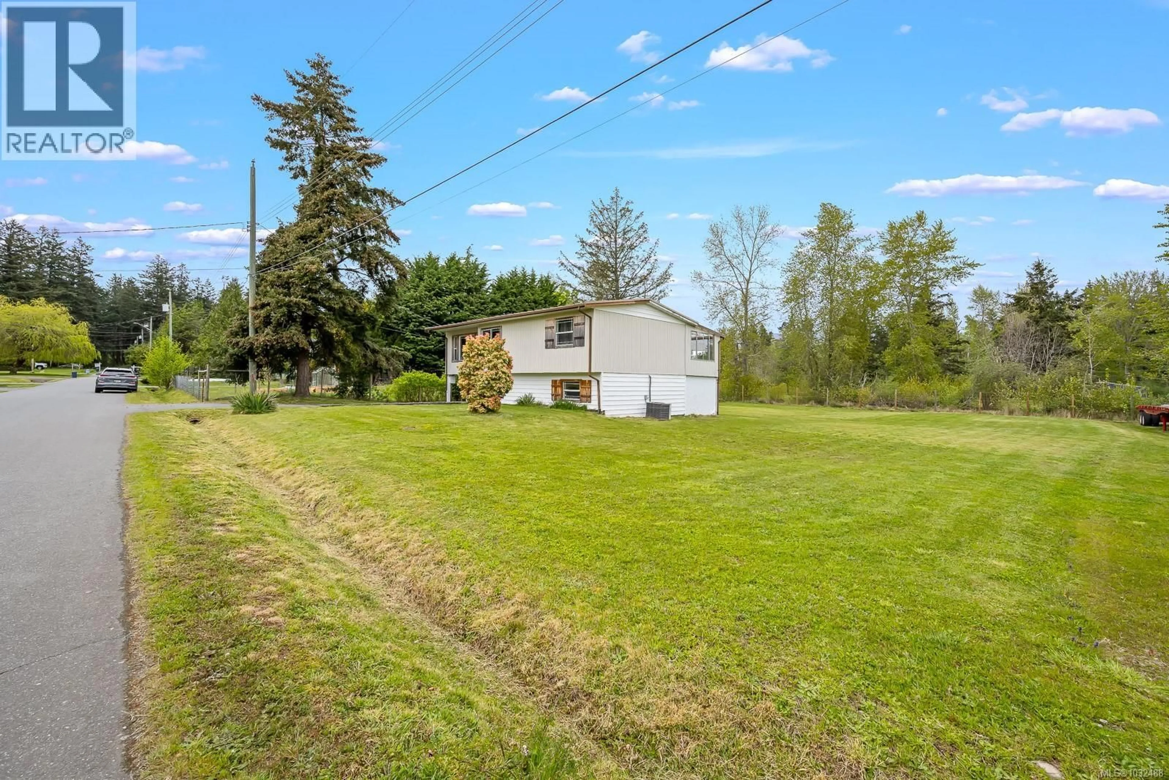 A pic from outside/outdoor area/front of a property/back of a property/a pic from drone, water/lake/river/ocean view for 1238 DON ROAD, Comox British Columbia V9M4C4