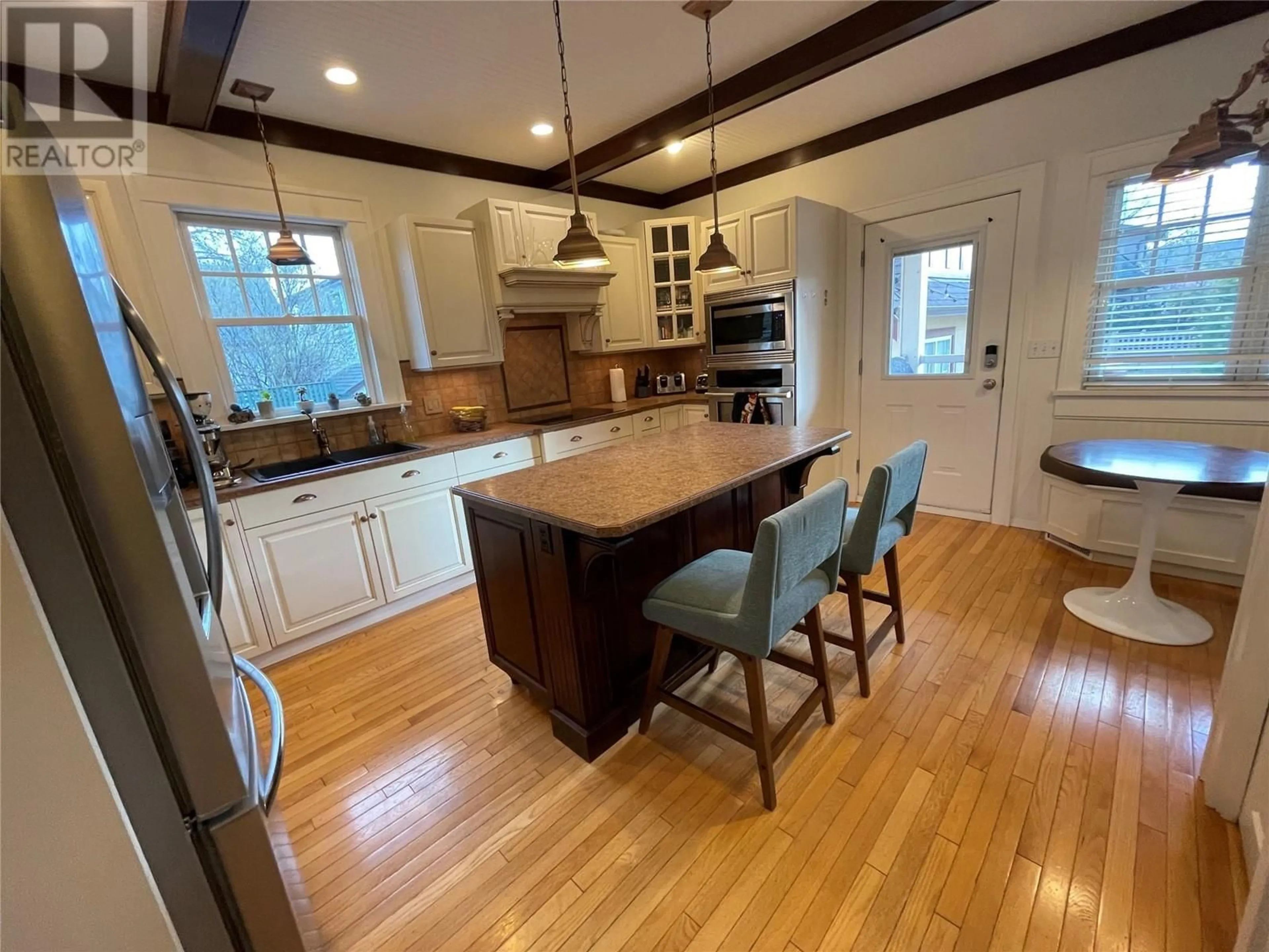 Open concept kitchen, wood/laminate floor for 1912 ABBOTT STREET, Kelowna British Columbia V1Y1B7