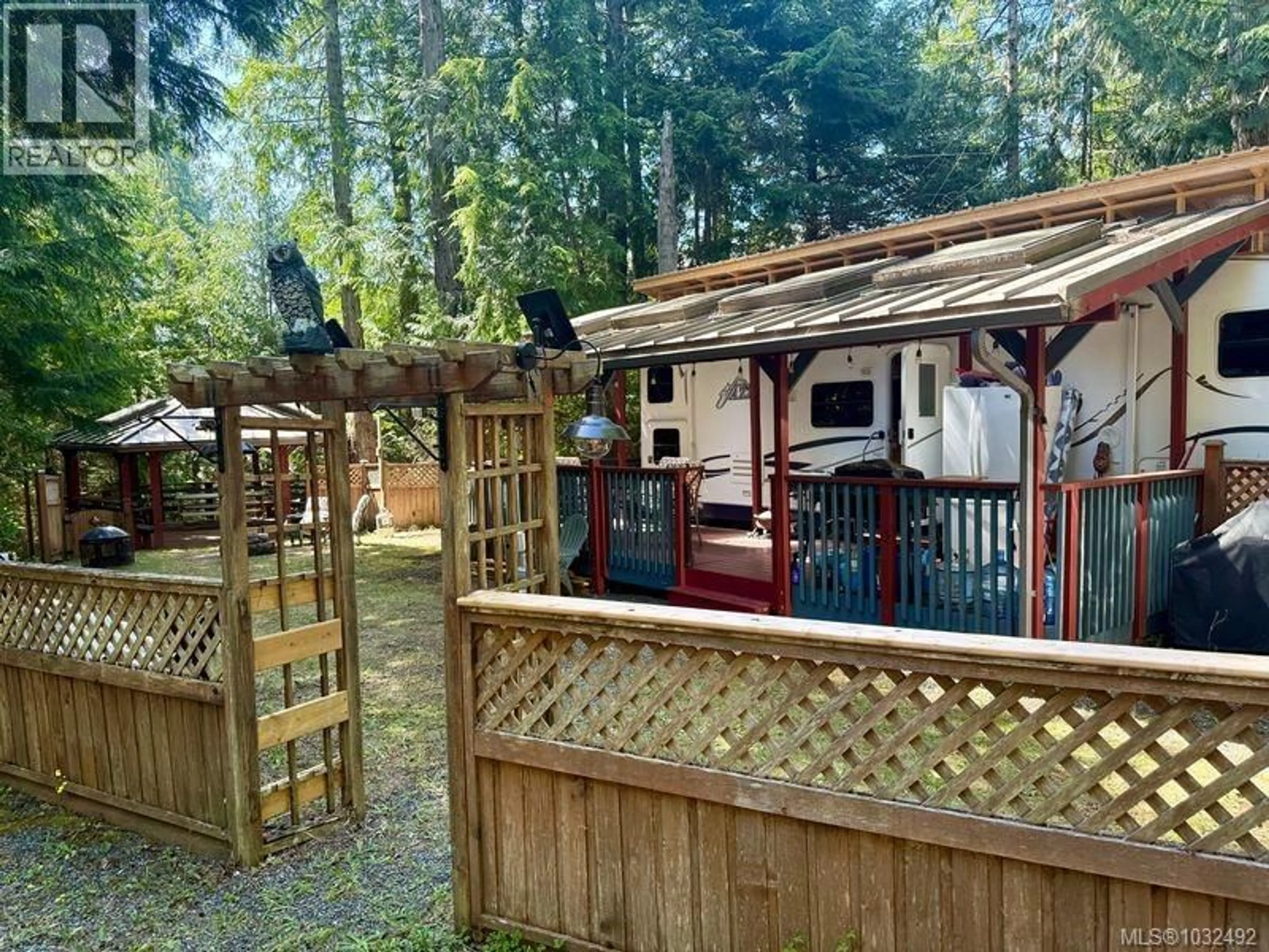 A pic from outside/outdoor area/front of a property/back of a property/a pic from drone, forest/trees view for C8 - 2650 TURNBULL ROAD, Qualicum Beach British Columbia V9K2R2