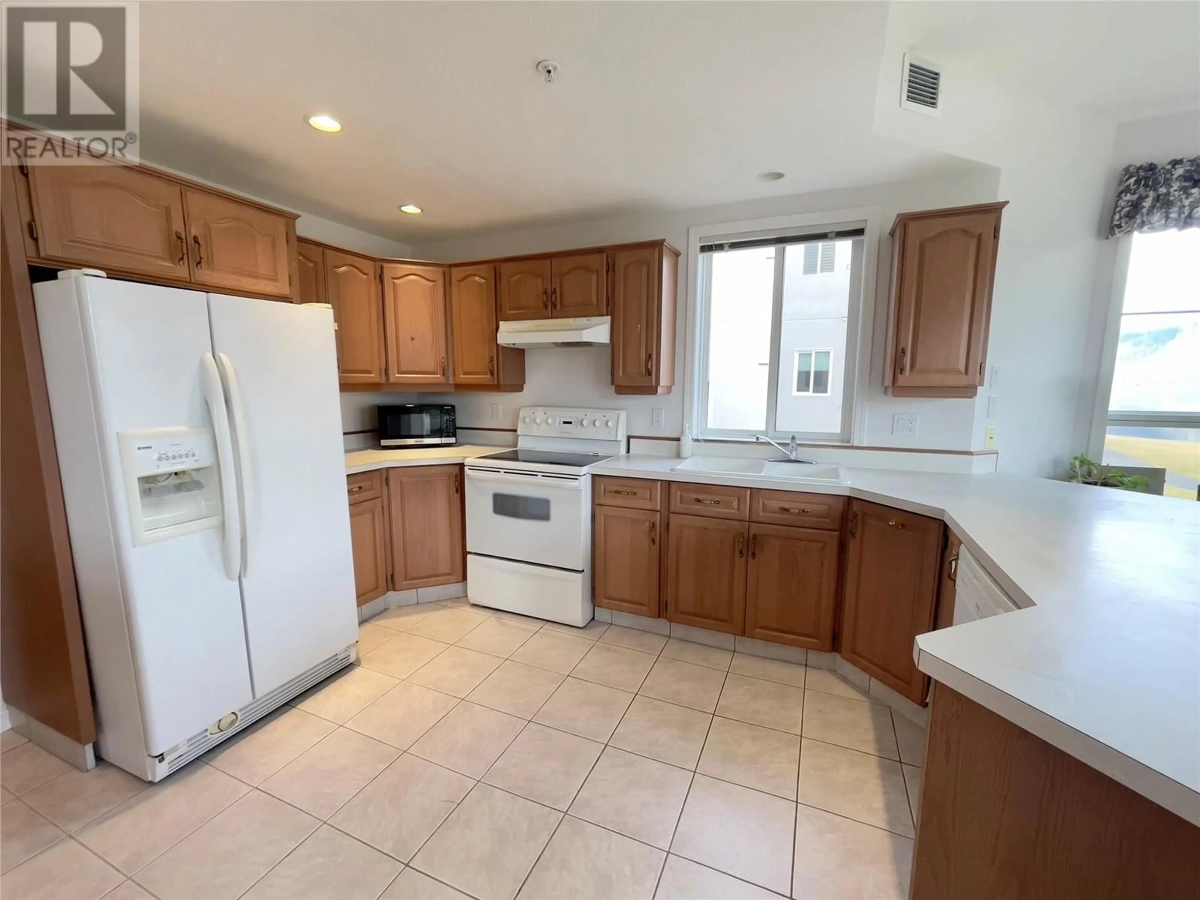 Standard kitchen, wood floors, cottage for 7801 SPARTAN Drive Unit# 215, Osoyoos British Columbia V0H1V0