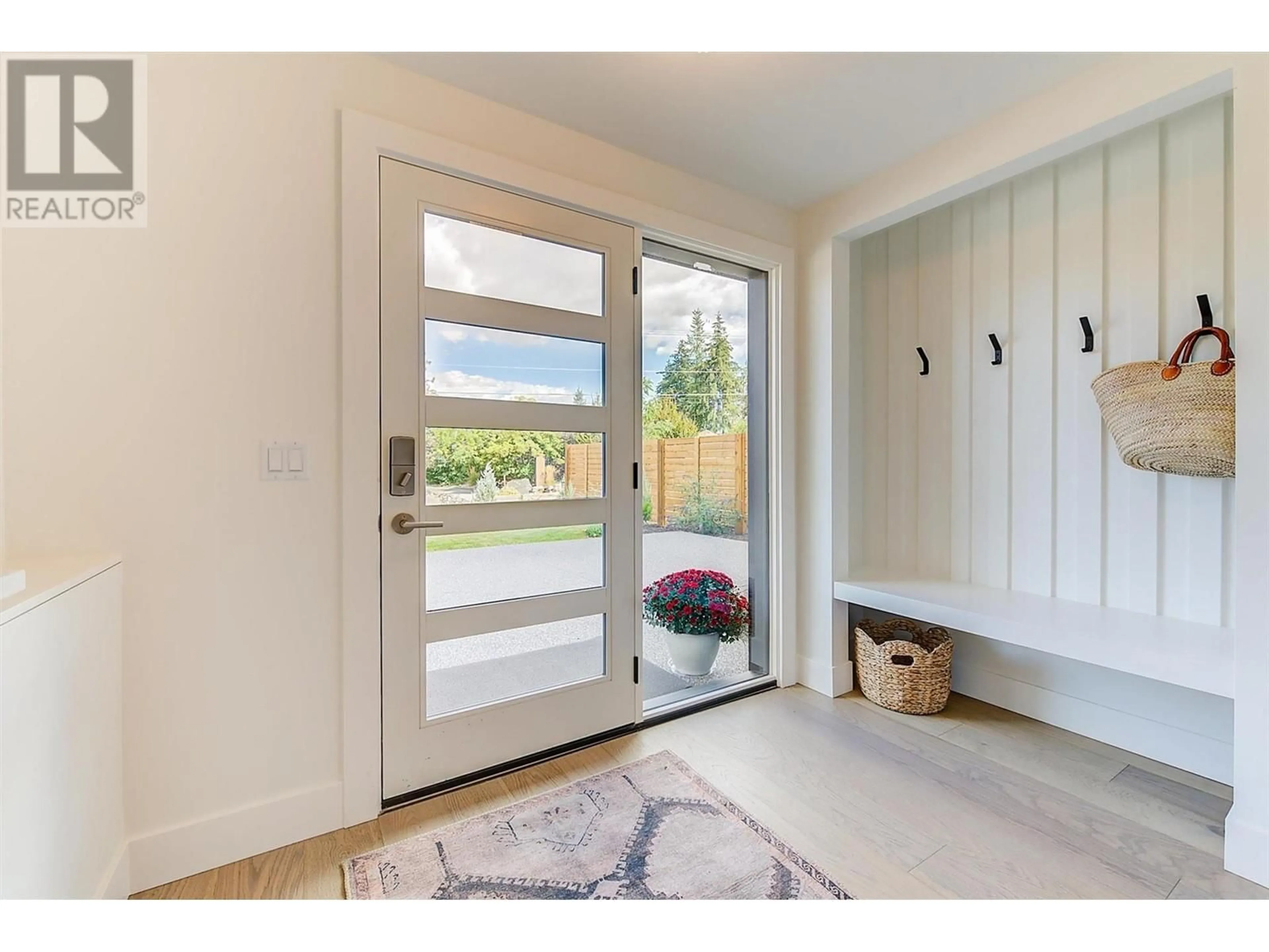 Indoor entryway, wood floors for 761 Barnaby Road, Kelowna British Columbia V1W4N9