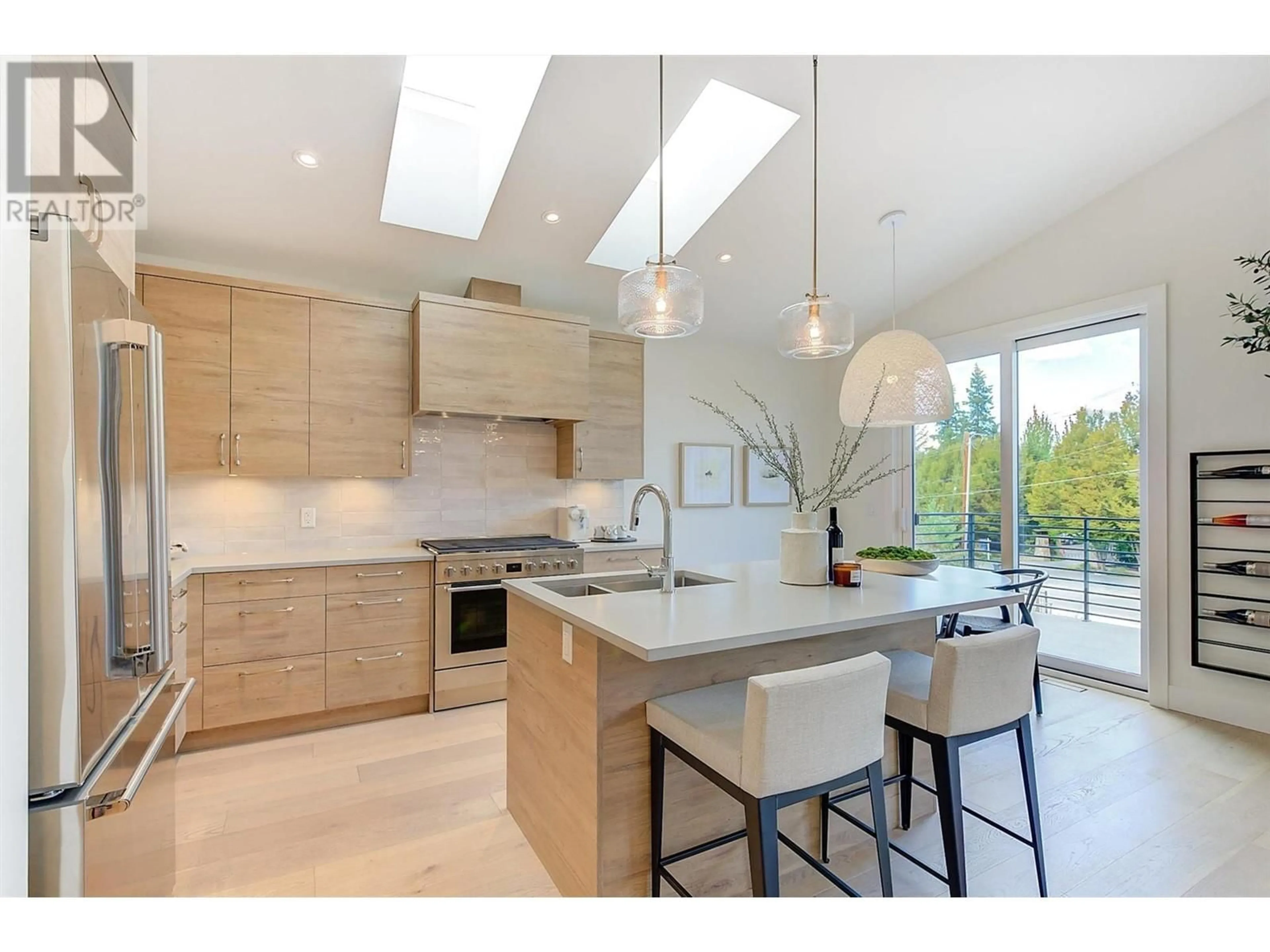 Contemporary kitchen, wood floors for 761 Barnaby Road, Kelowna British Columbia V1W4N9