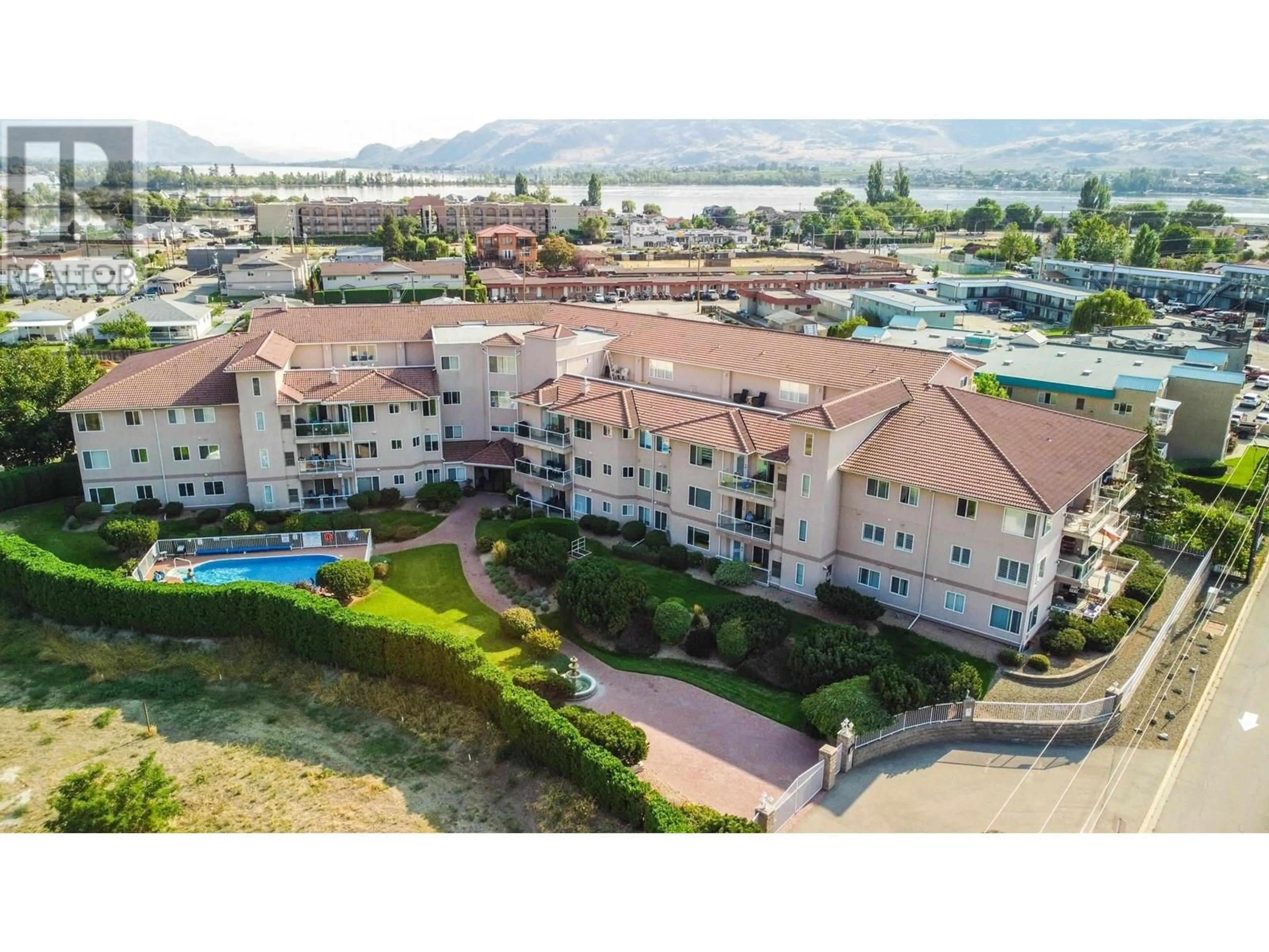 A pic from outside/outdoor area/front of a property/back of a property/a pic from drone, mountain view for 100 - 6805 COTTONWOOD DRIVE, Osoyoos British Columbia V0H1V3