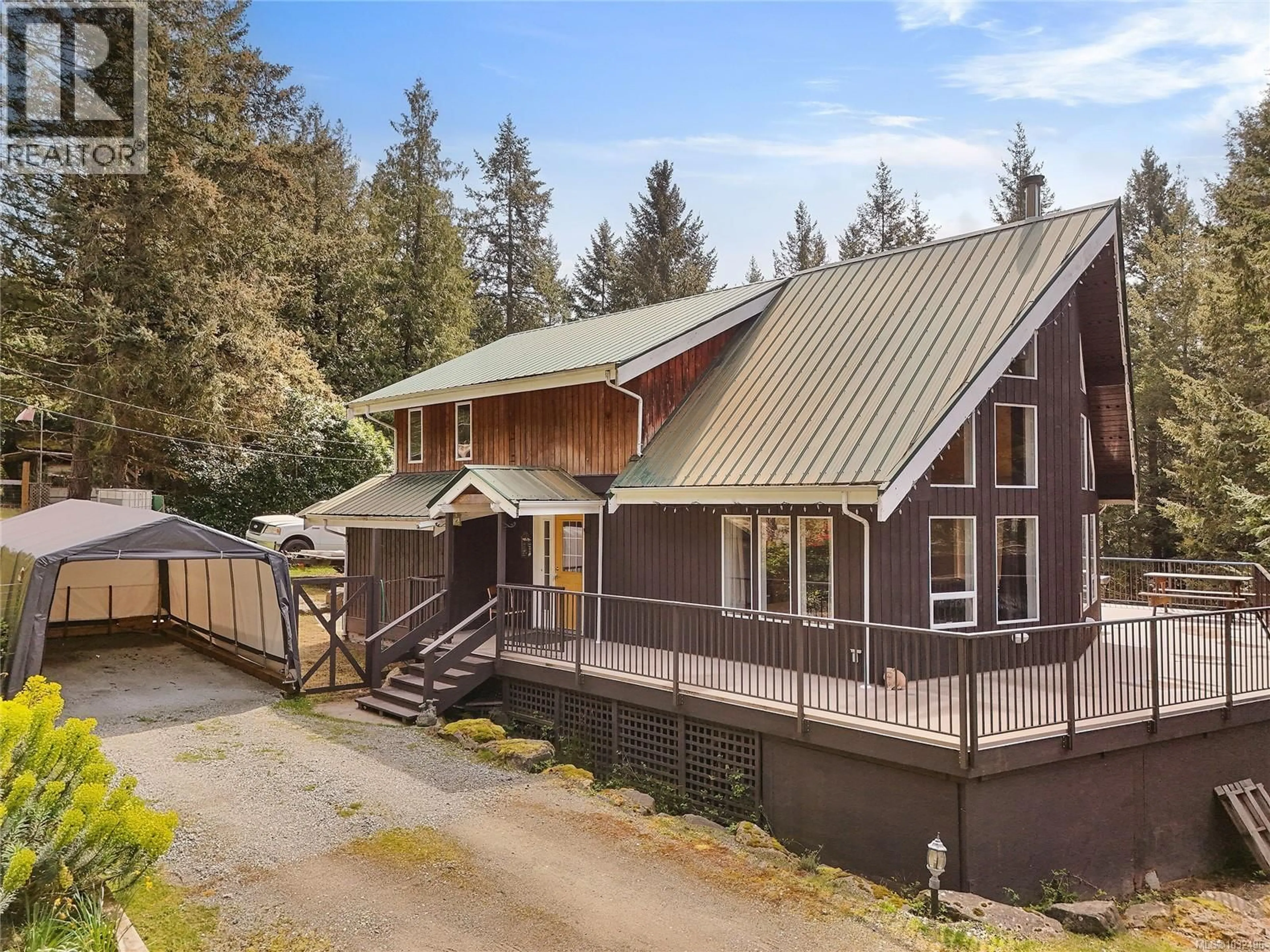 A pic from outside/outdoor area/front of a property/back of a property/a pic from drone, unknown for 412 WOOD DALE DRIVE, Mayne Island British Columbia V0N2J2
