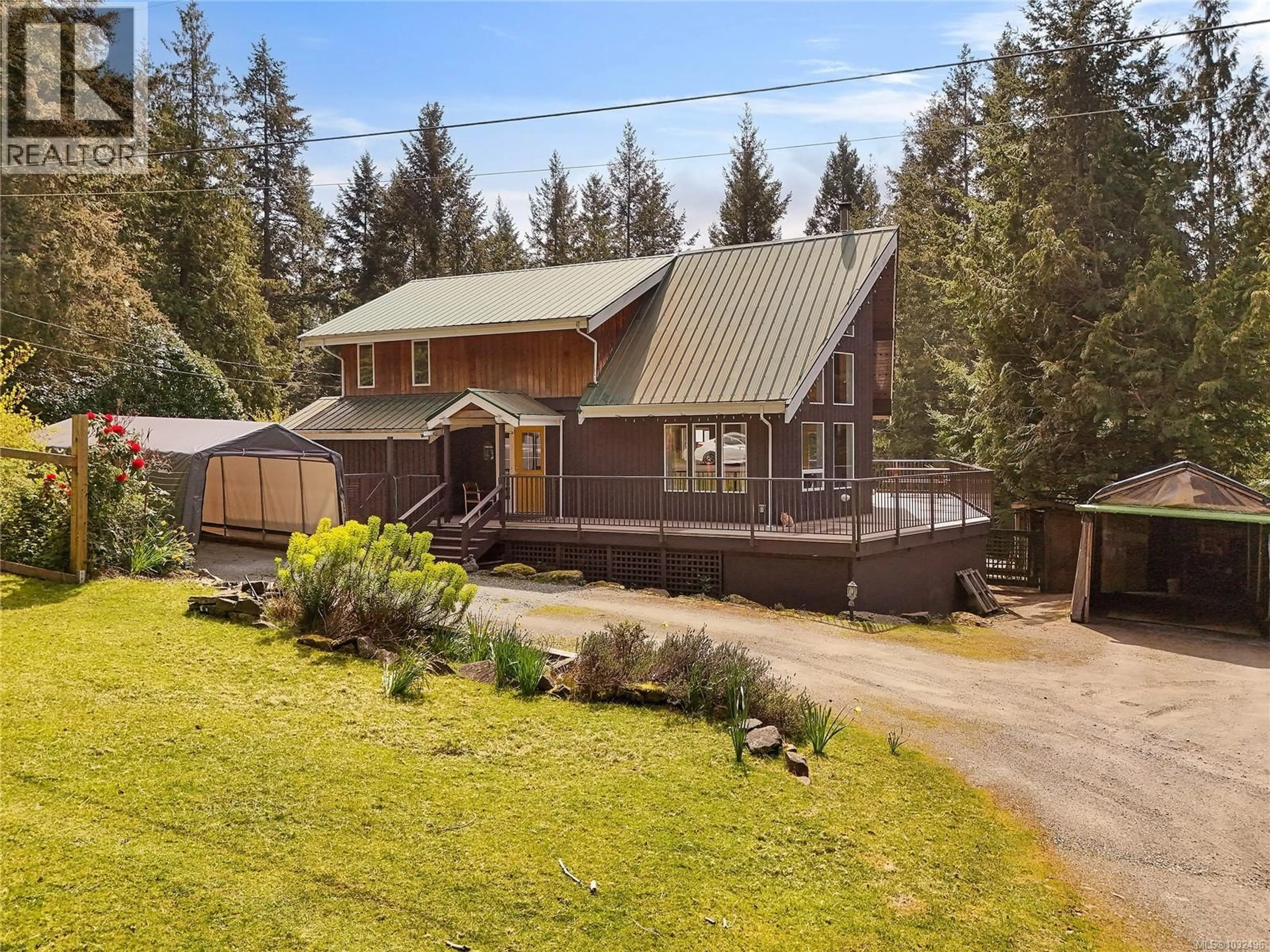 A pic from outside/outdoor area/front of a property/back of a property/a pic from drone, unknown for 412 WOOD DALE DRIVE, Mayne Island British Columbia V0N2J2