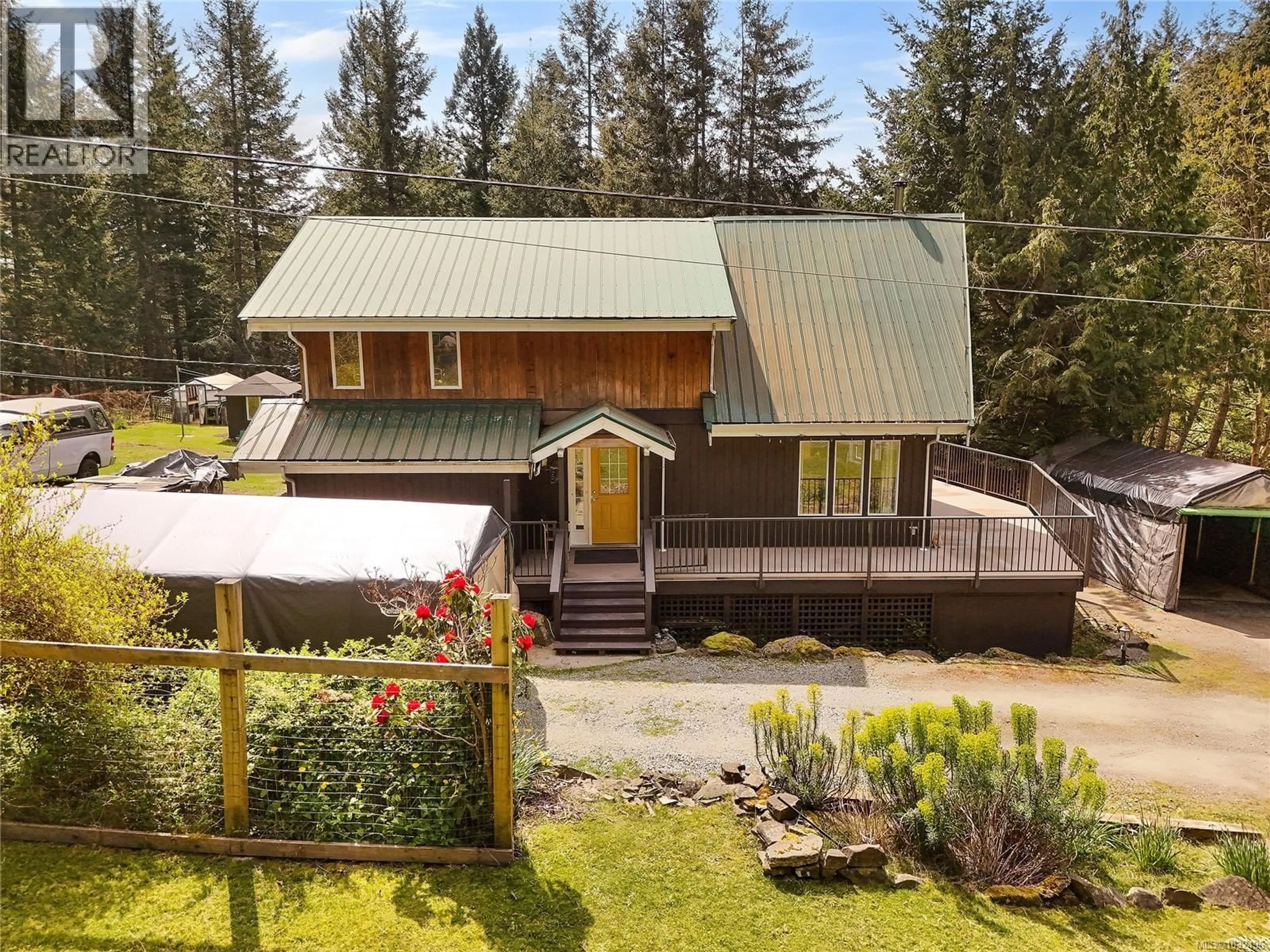 A pic from outside/outdoor area/front of a property/back of a property/a pic from drone, unknown for 412 WOOD DALE DRIVE, Mayne Island British Columbia V0N2J2