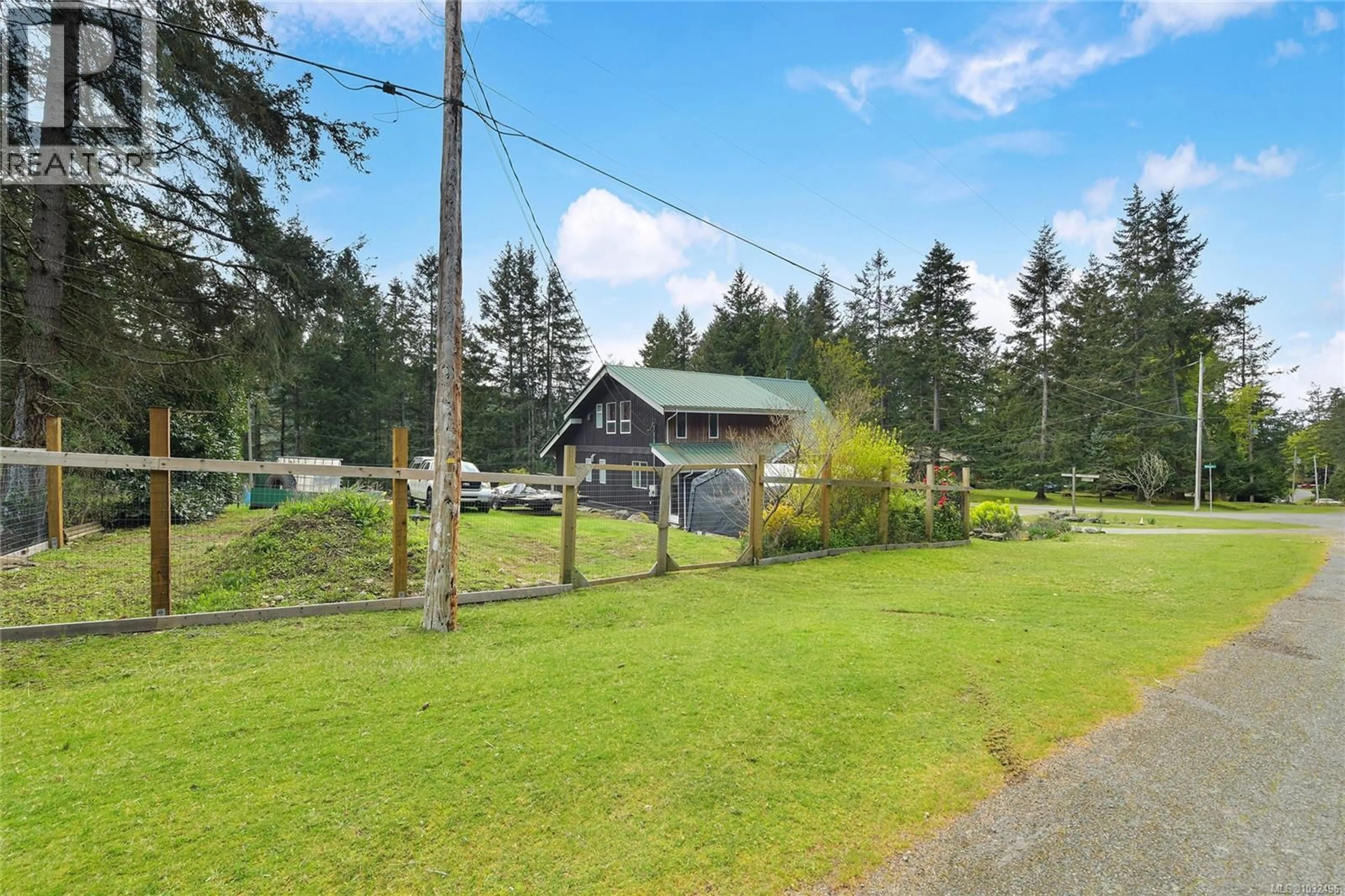 A pic from outside/outdoor area/front of a property/back of a property/a pic from drone, unknown for 412 WOOD DALE DRIVE, Mayne Island British Columbia V0N2J2