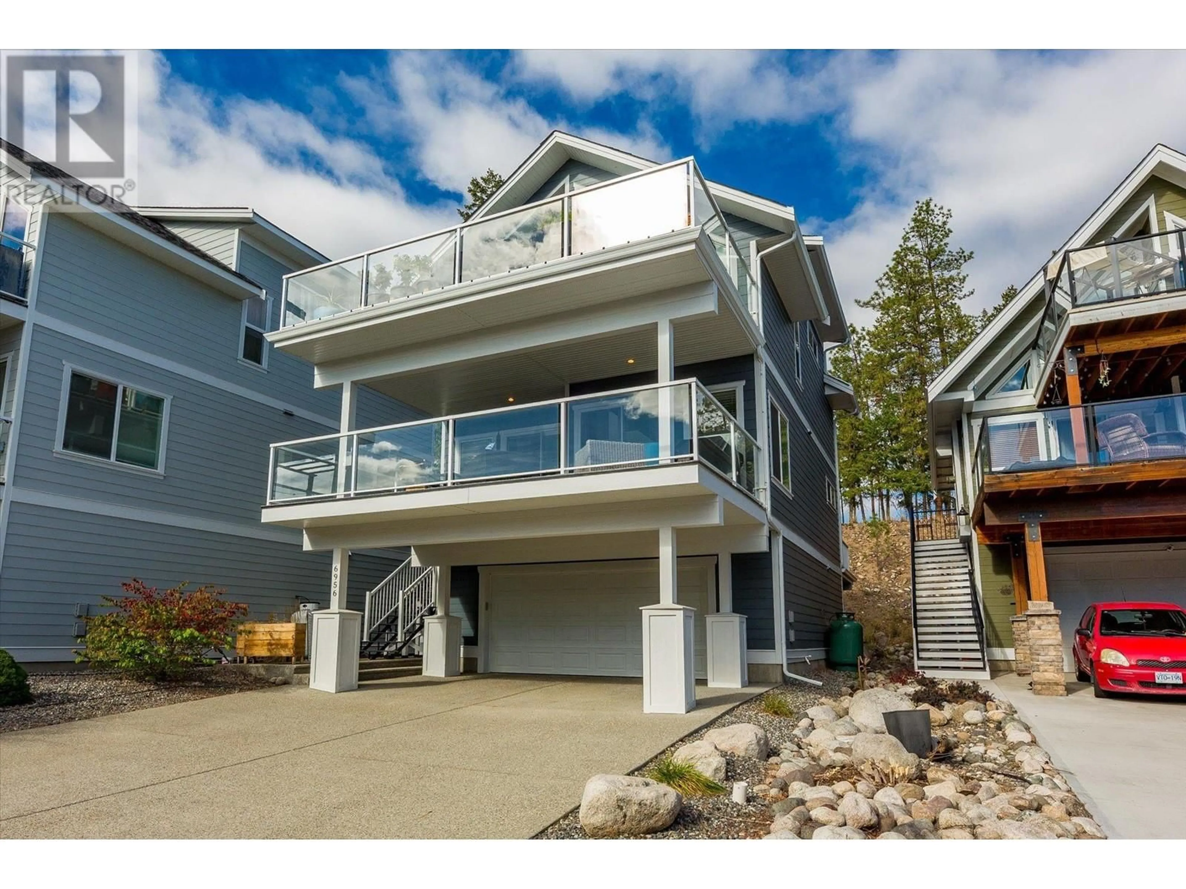 A pic from exterior of the house or condo, cottage for 6956 Terazona Loop Unit# 410, Kelowna British Columbia V1Z3R8