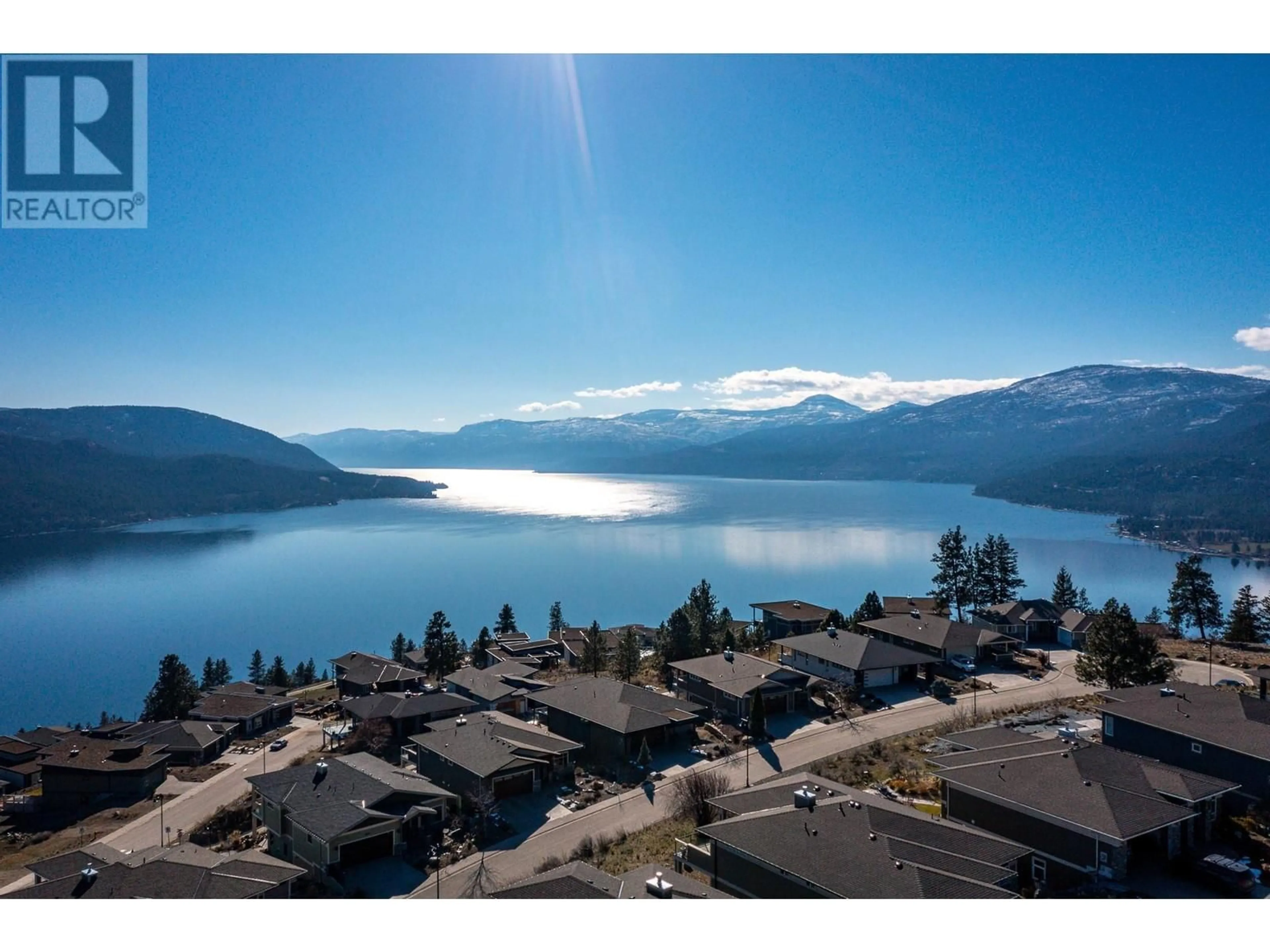 A pic from outside/outdoor area/front of a property/back of a property/a pic from drone, water/lake/river/ocean view for 8972 BAYSWATER PLACE, Vernon British Columbia V1H2K9