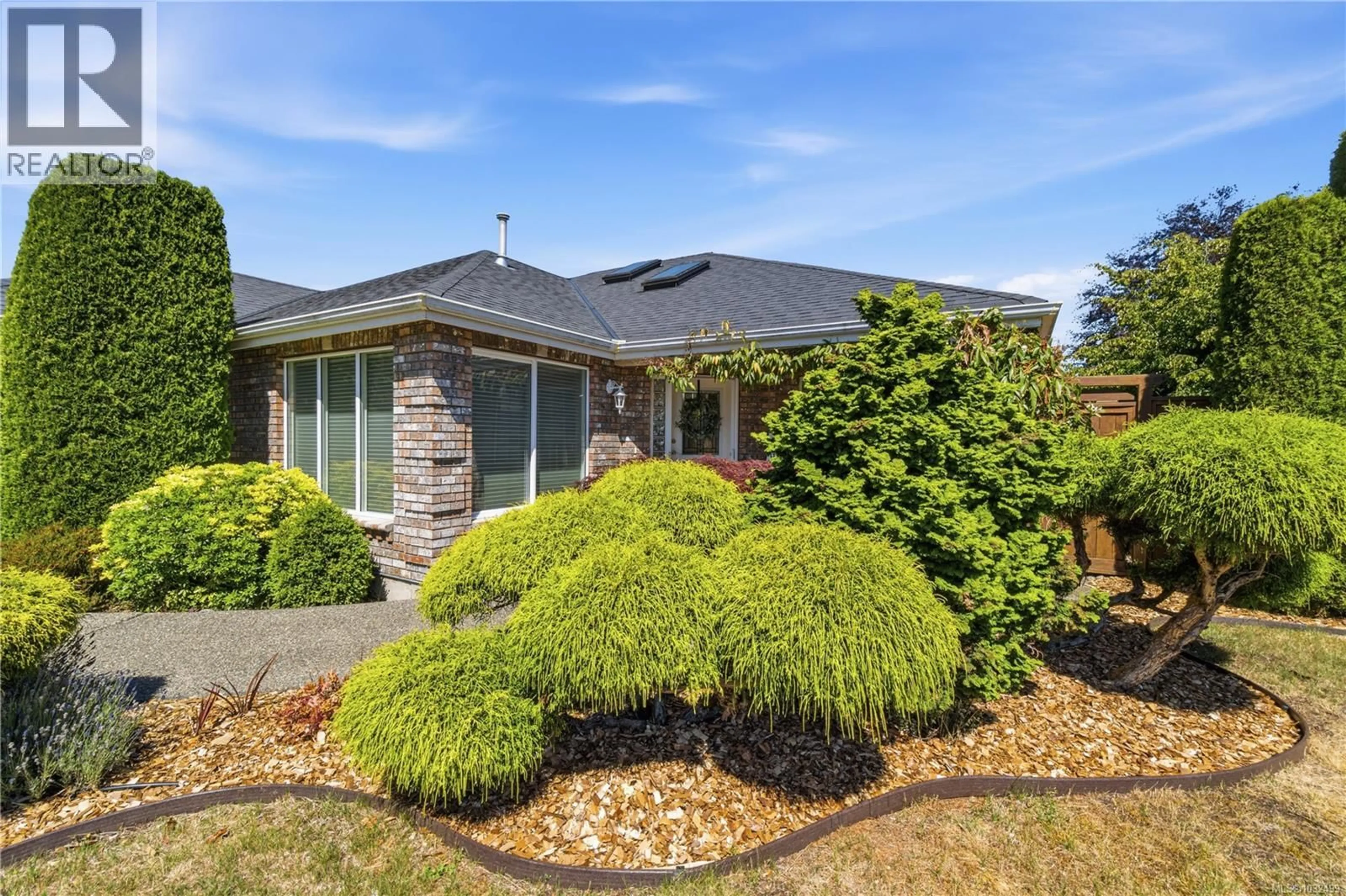Home with brick exterior material, street for 767 KENSINGTON PLACE, Qualicum Beach British Columbia V9K2K3