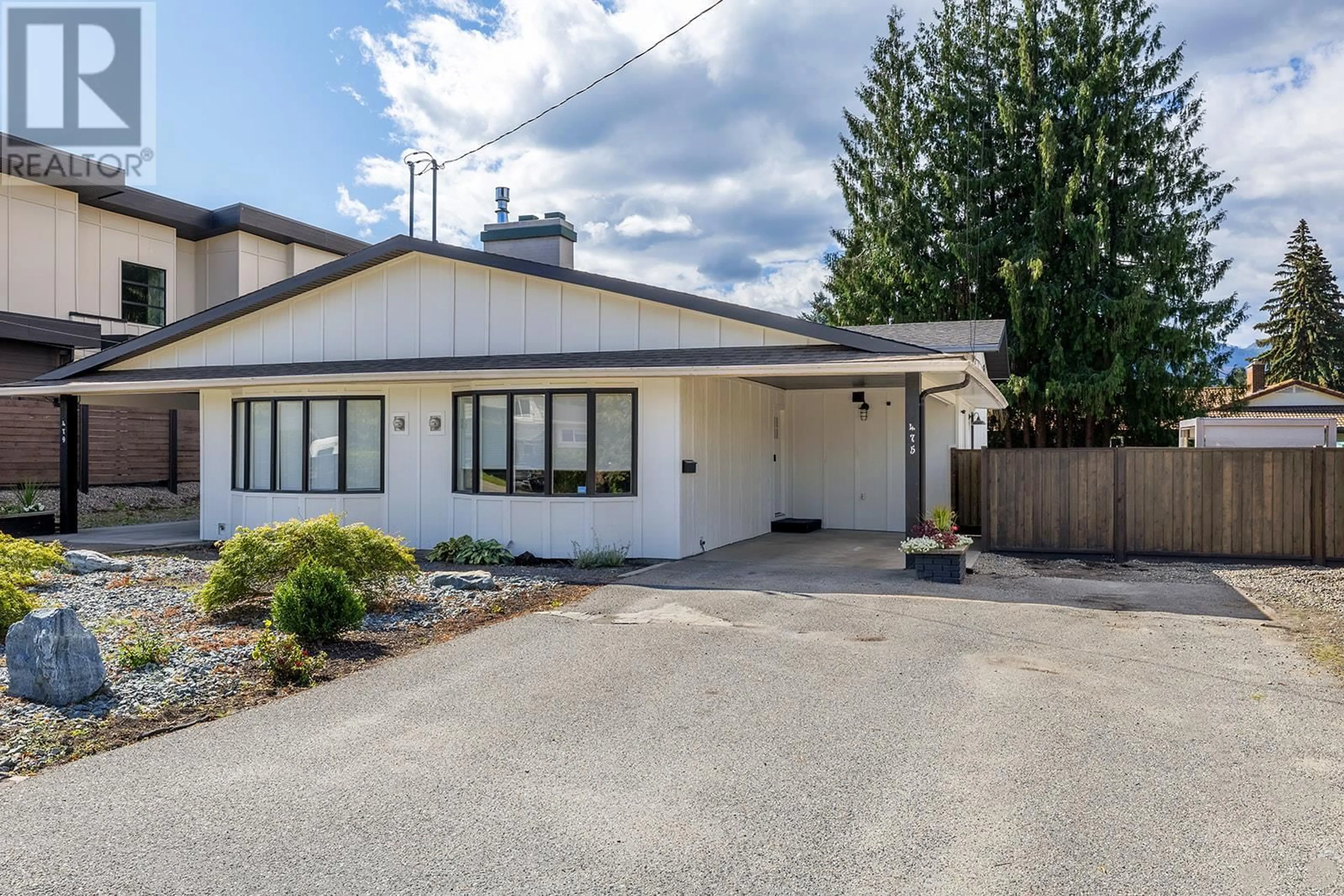 Frontside or backside of a home, the street view for 475 Eldorado Road, Kelowna British Columbia V1W1G7