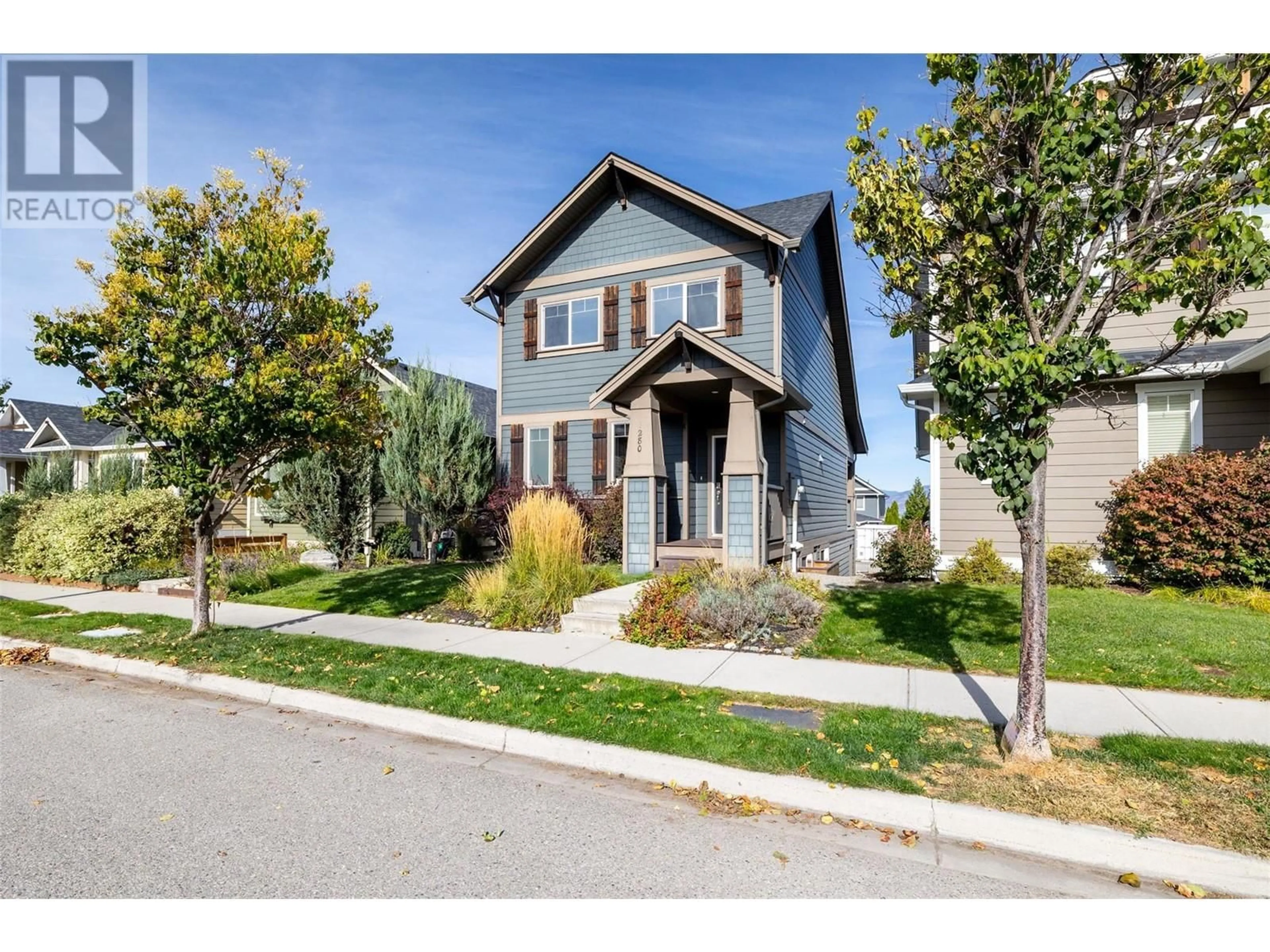 Frontside or backside of a home, the street view for 1280 Bergamot Avenue, Kelowna British Columbia V1W5K5