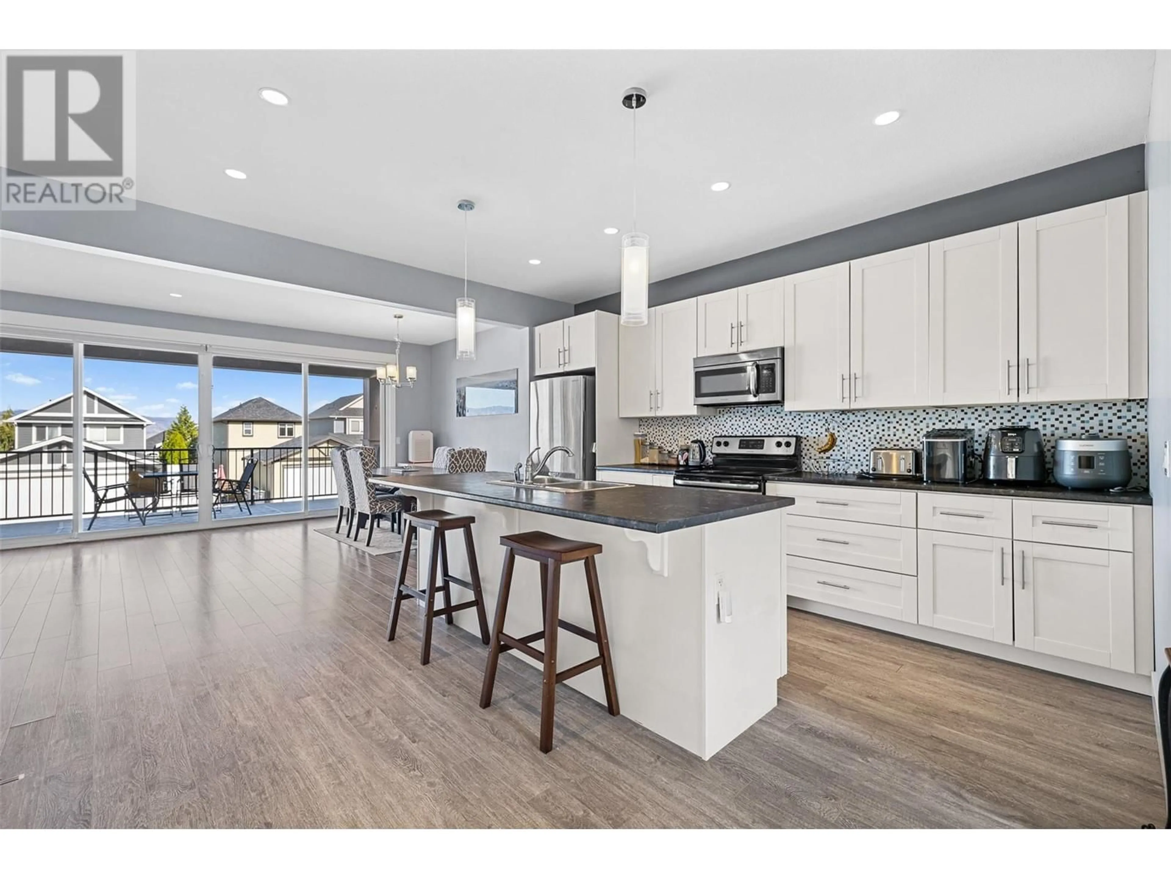 Open concept kitchen for 1280 Bergamot Avenue, Kelowna British Columbia V1W5K5