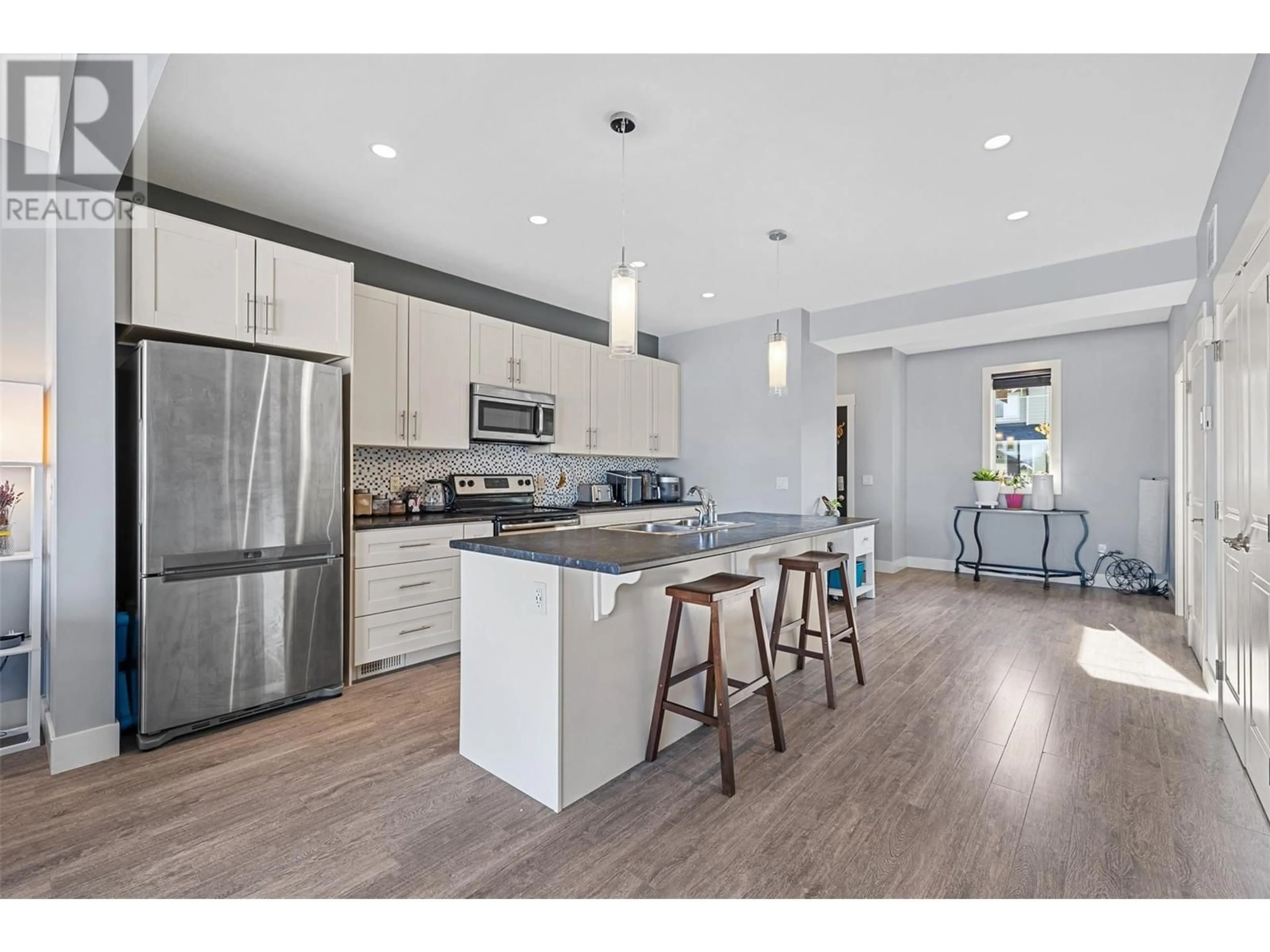 Open concept kitchen for 1280 Bergamot Avenue, Kelowna British Columbia V1W5K5