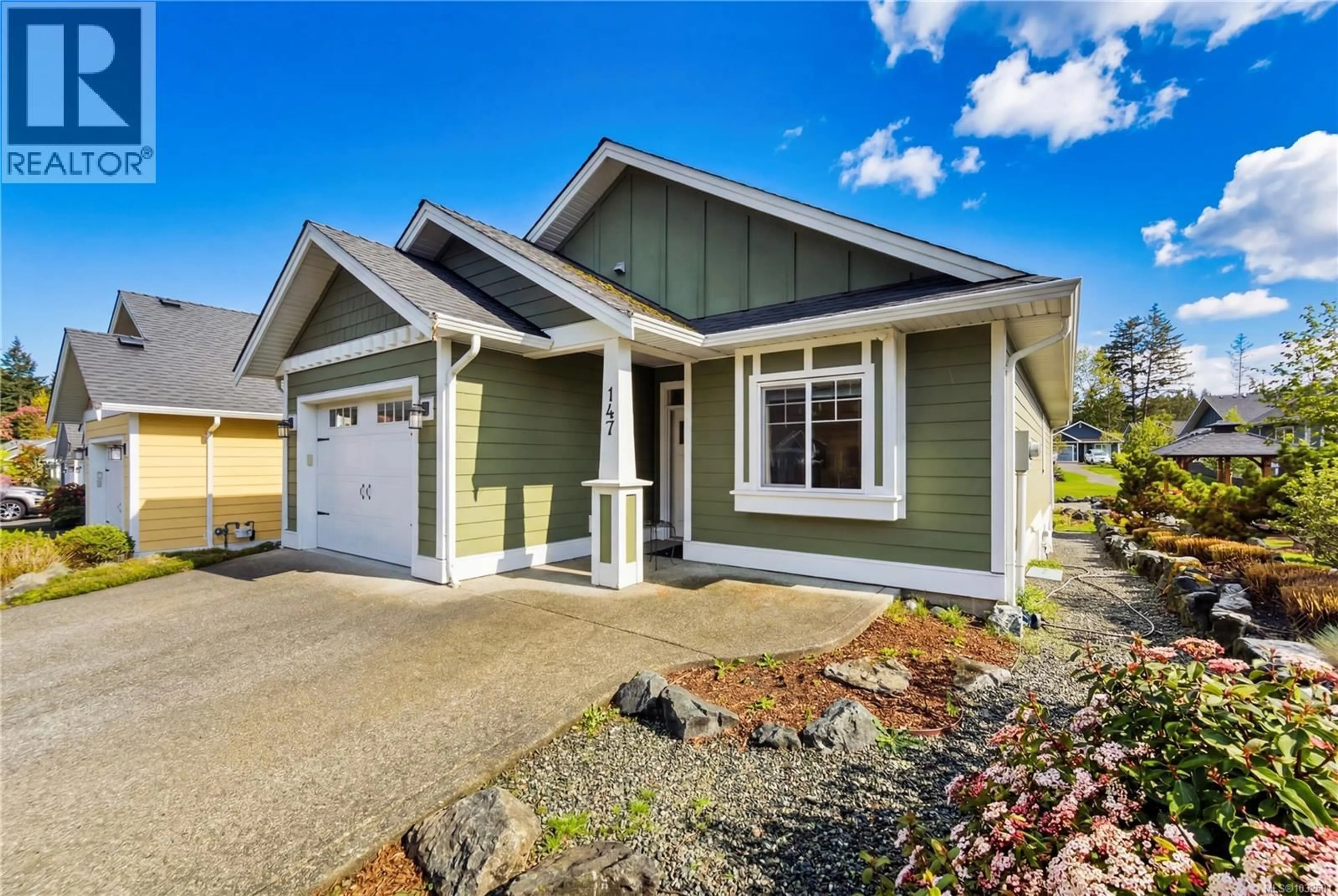 Home with vinyl exterior material, street for 147 VILLAGE WAY, Duncan British Columbia V9L0G6