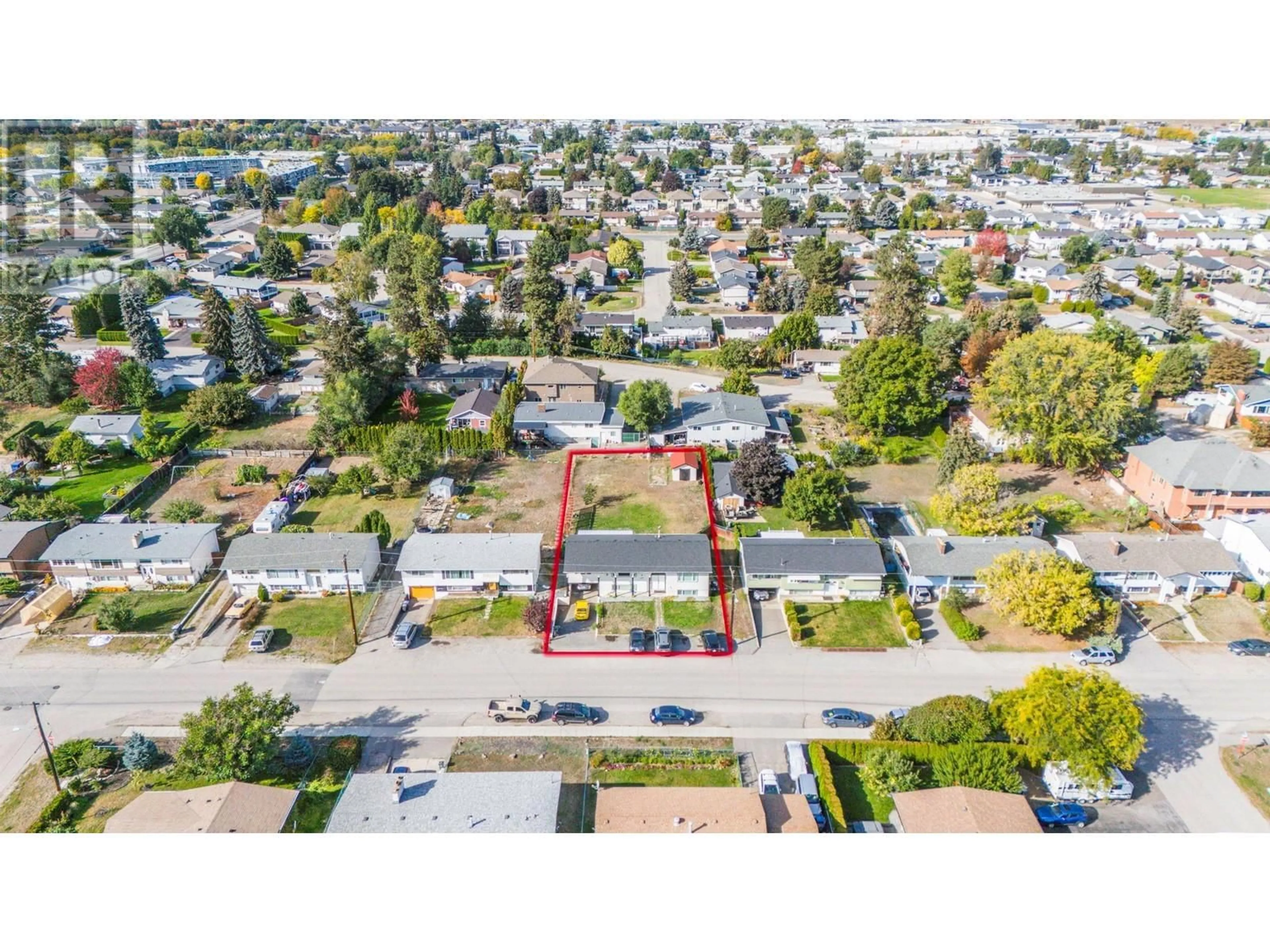 A pic from outside/outdoor area/front of a property/back of a property/a pic from drone, street for 680 TARTAN ROAD, Rutland British Columbia V1X3L3