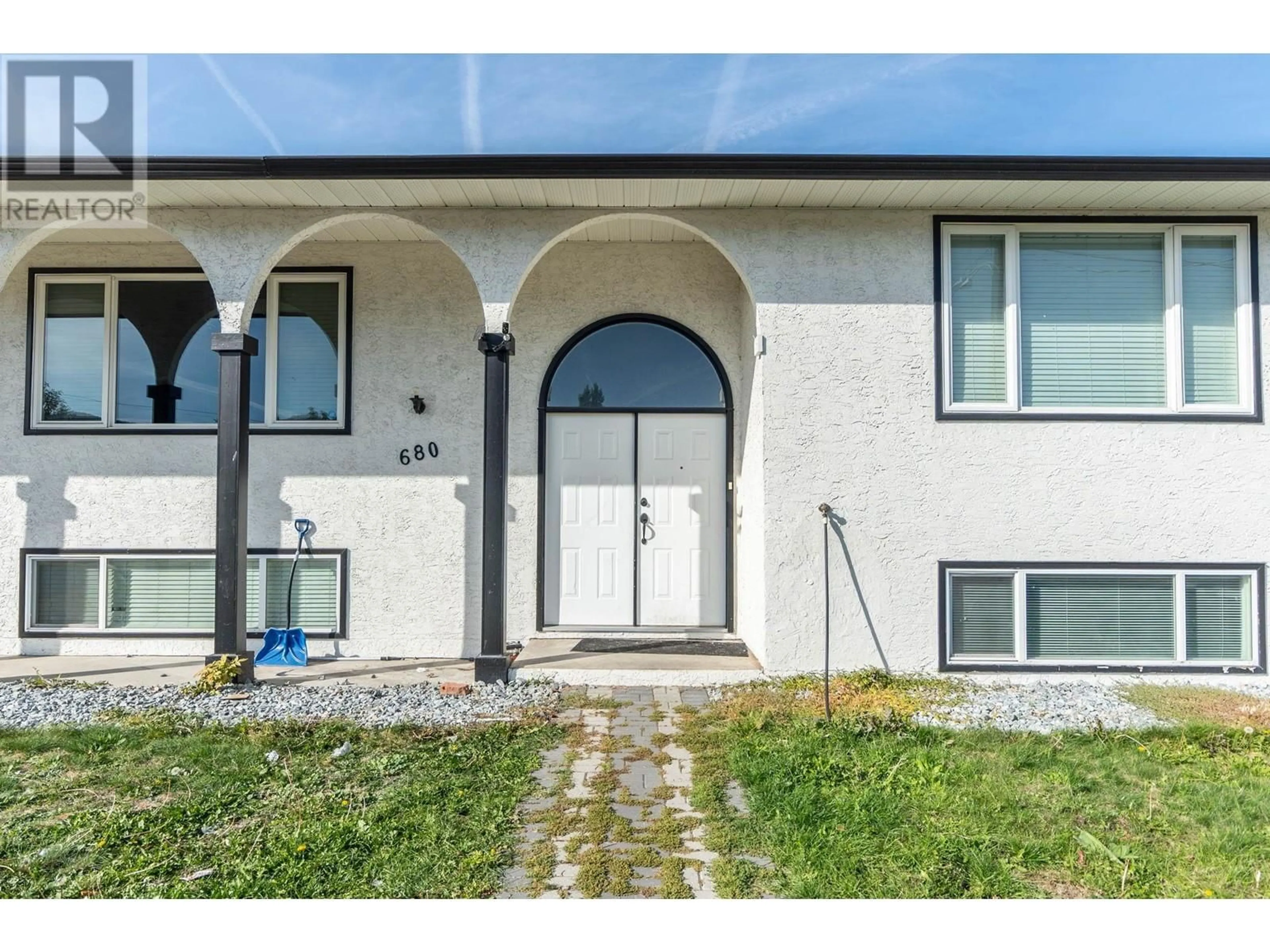 Home with vinyl exterior material, street for 680 TARTAN ROAD, Rutland British Columbia V1X3L3
