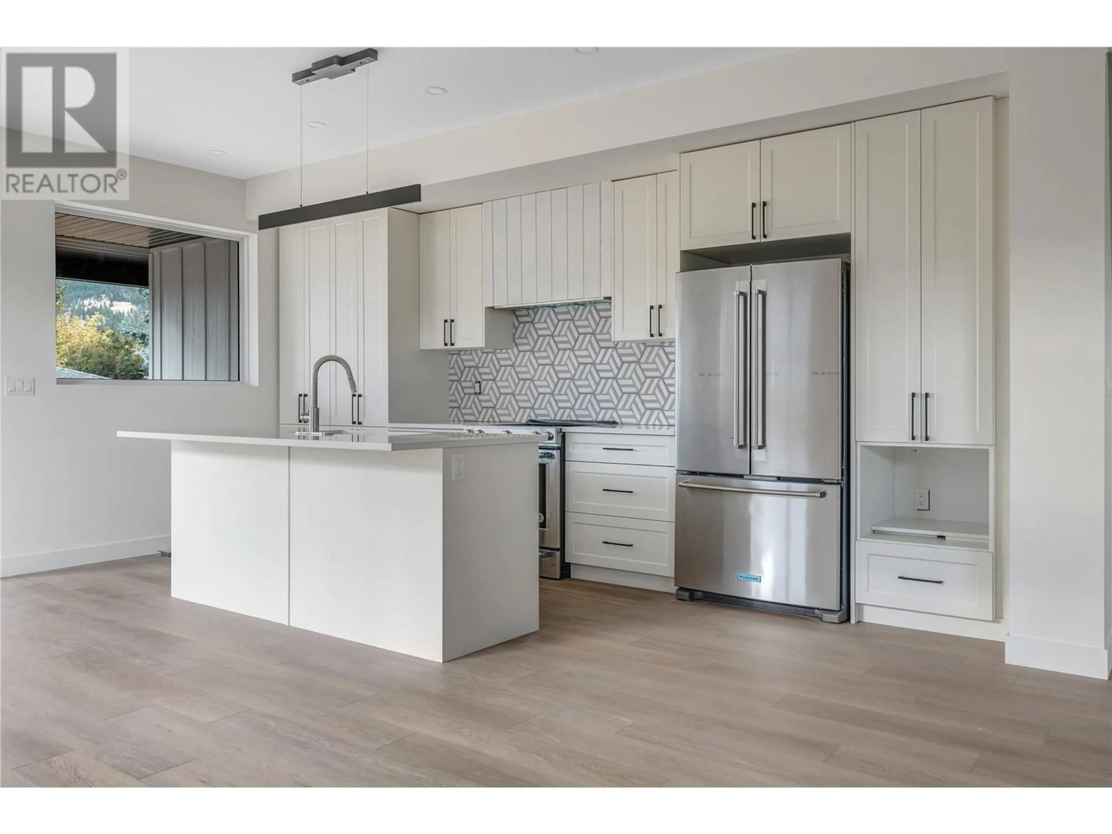 Open concept kitchen for 10907 Prairie Valley Road Unit# 1, Summerland British Columbia V0H1Z8