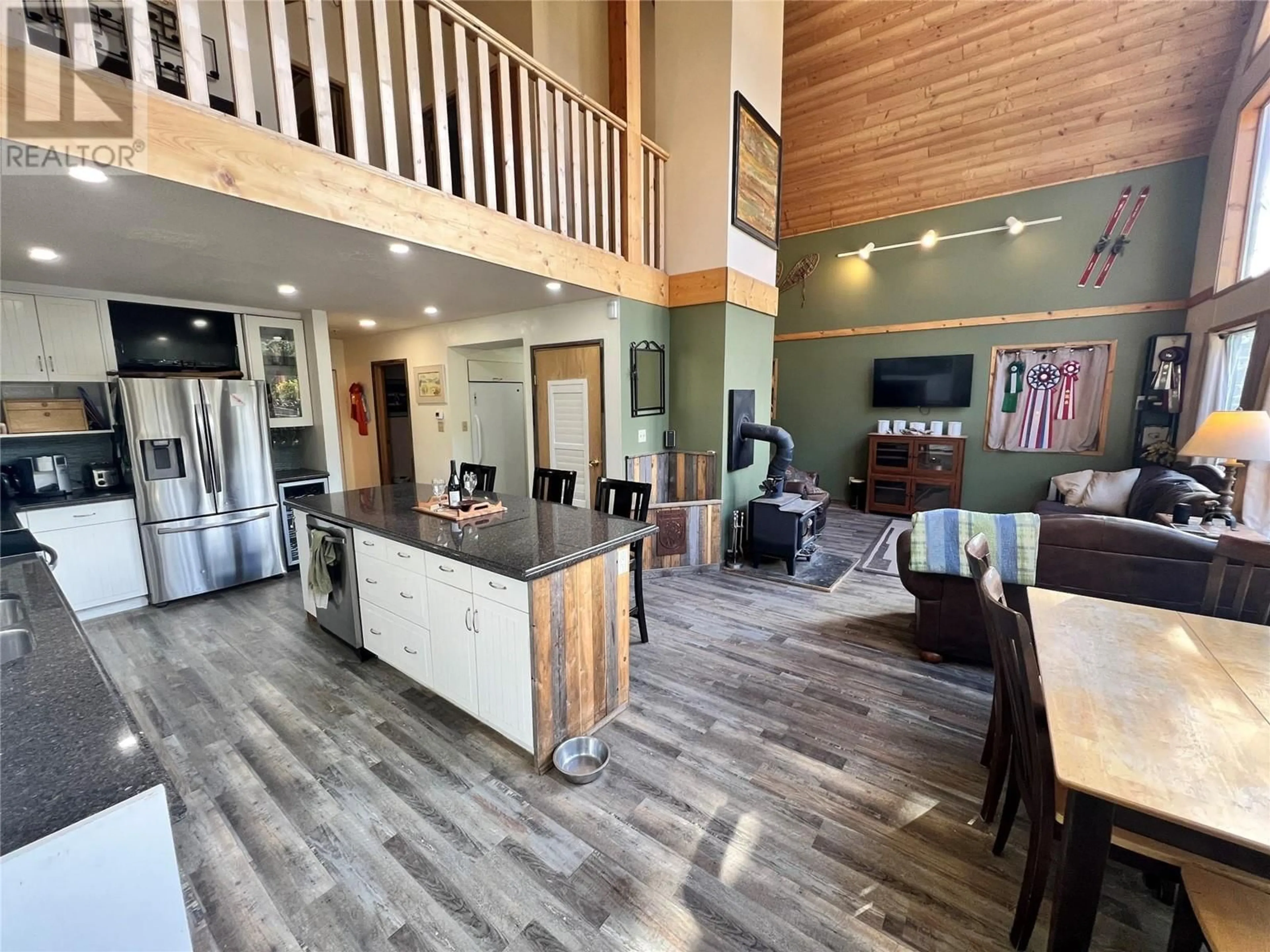 Indoor lobby, wood floors for 145 WHITETAIL Road, Penticton British Columbia V2A8L8