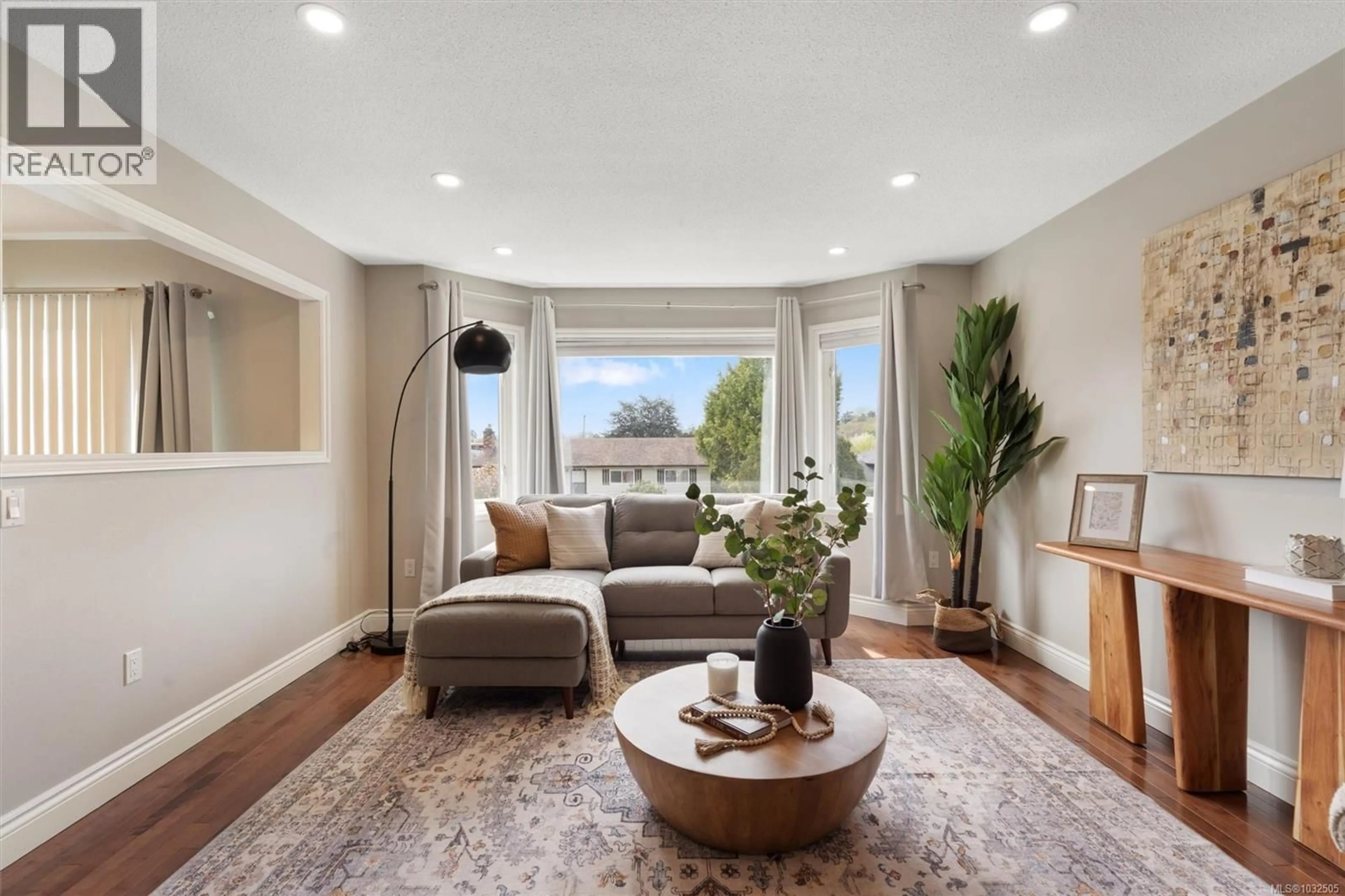 Living room with furniture, unknown for 1690 TAMPICO PLACE, Saanich British Columbia V8N5H2