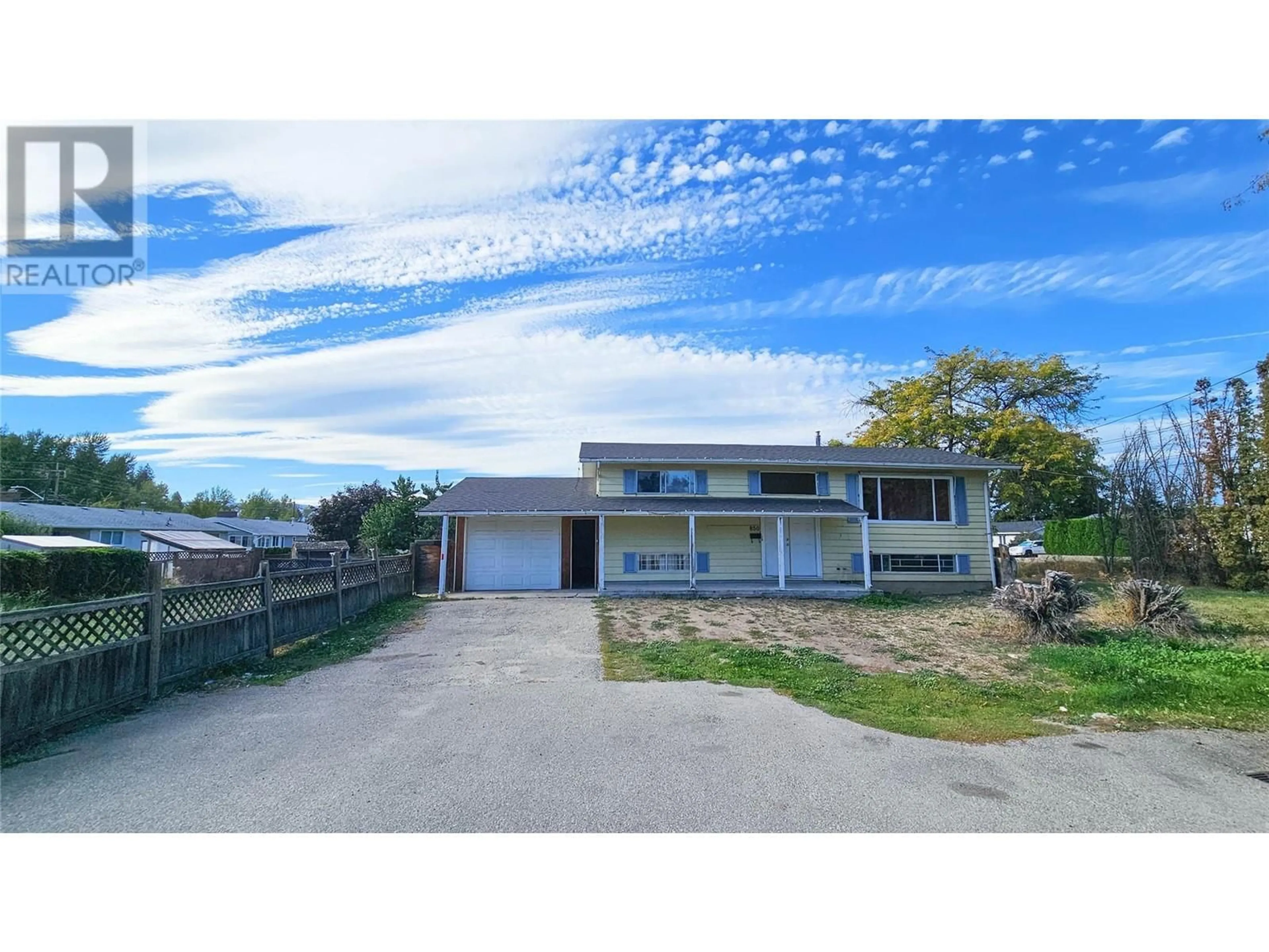 Frontside or backside of a home, the street view for 850 Kiniski Road, Kelowna British Columbia V1Y4Z9