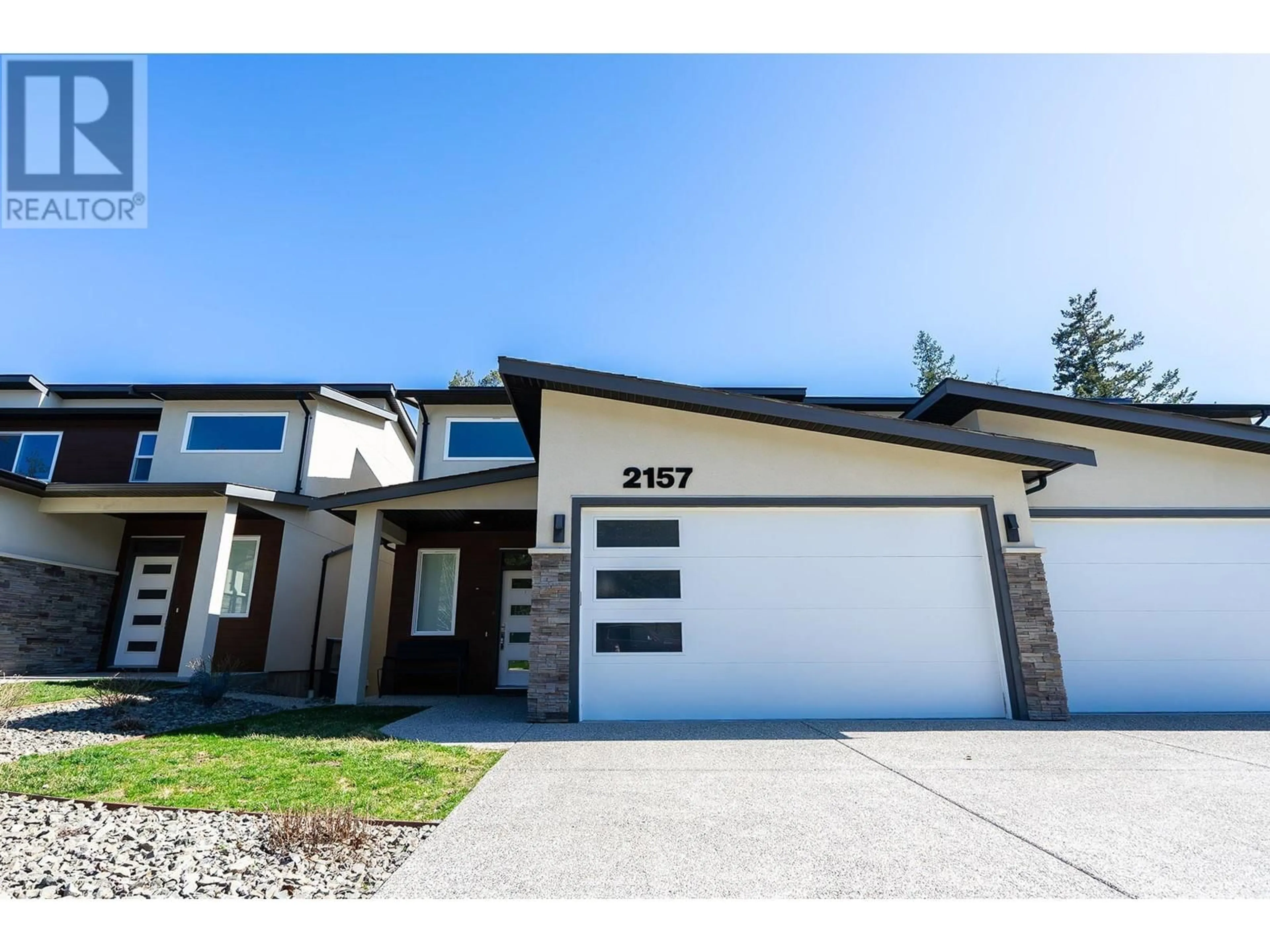 Frontside or backside of a home, the street view for 2157 McDougall Road, West Kelowna British Columbia V1Z2L6