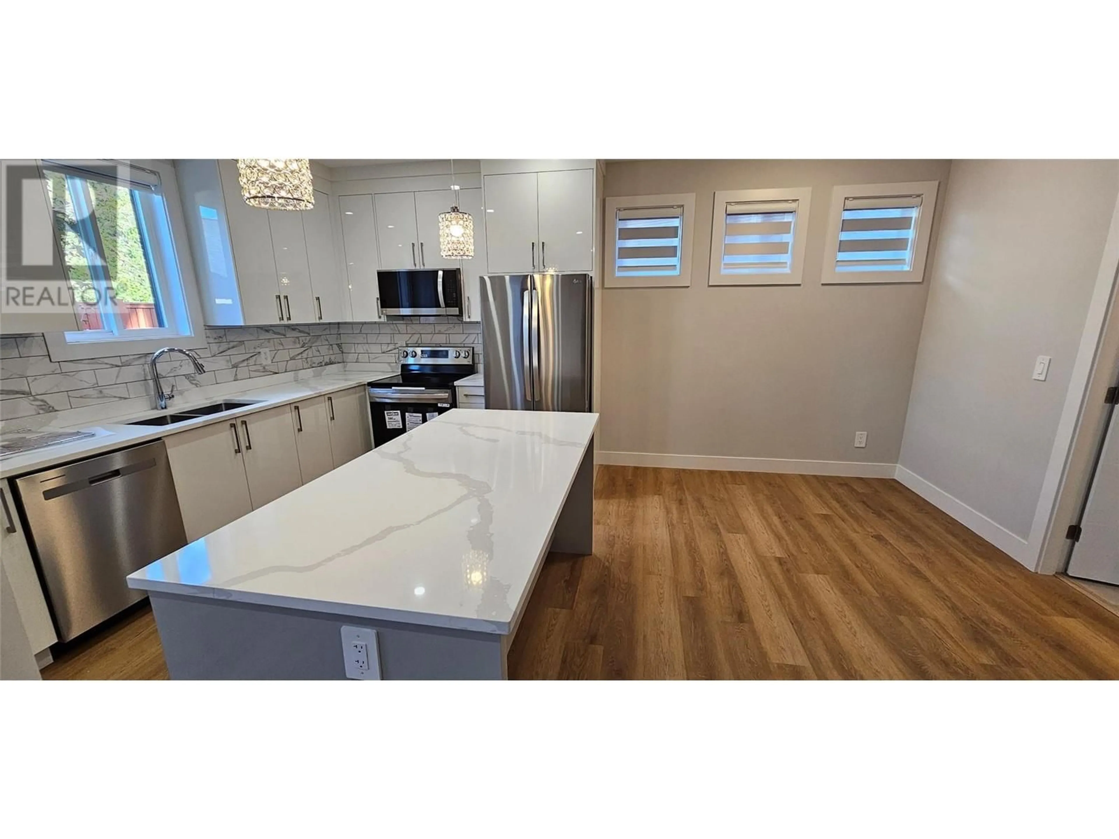 Open concept kitchen, unknown for 104 125 CALGARY AVENUE, Penticton British Columbia V2A2T7