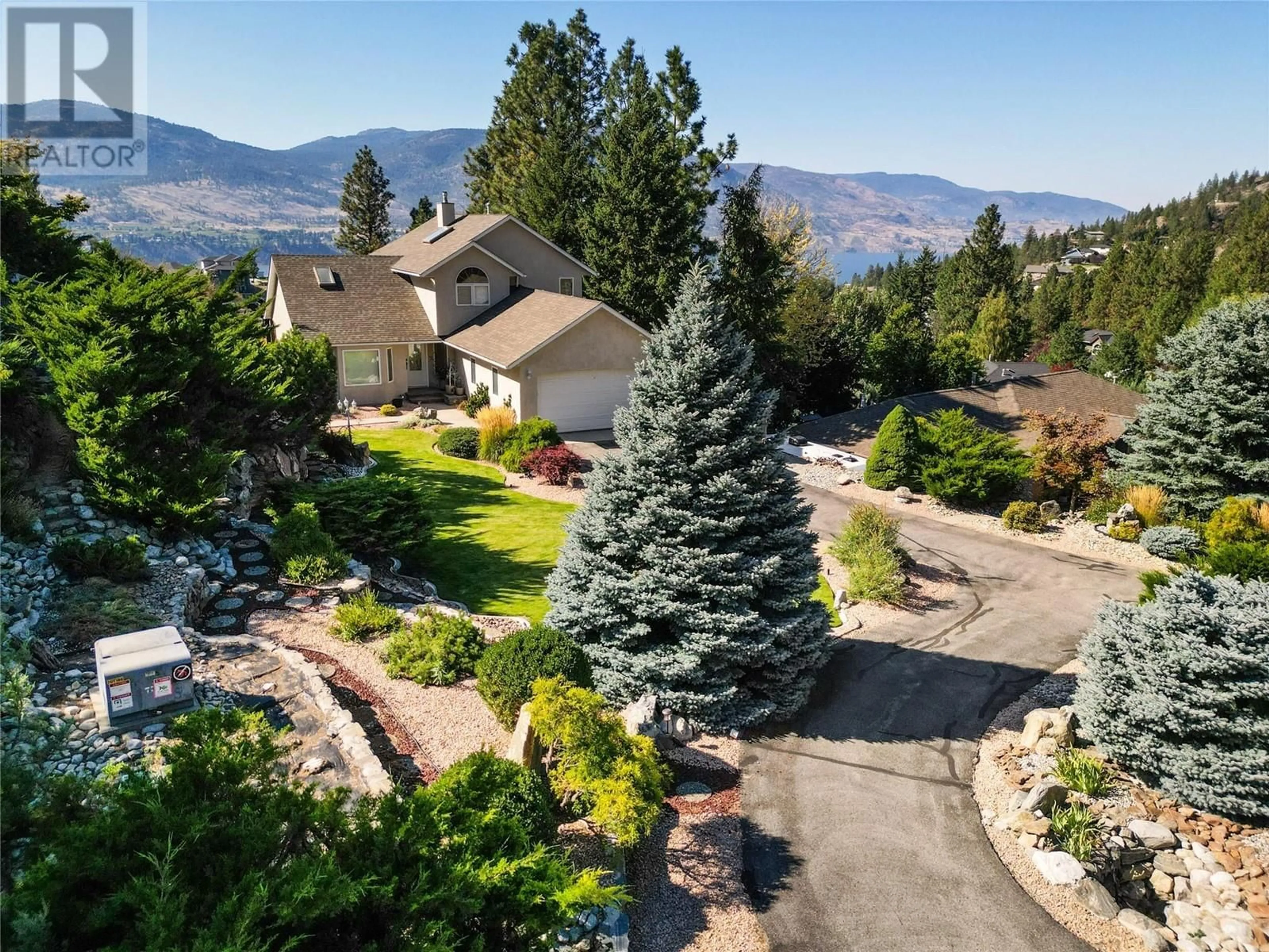 A pic from outside/outdoor area/front of a property/back of a property/a pic from drone, mountain view for 286 ONE QUAIL PLACE, Okanagan Falls British Columbia V0H1R0