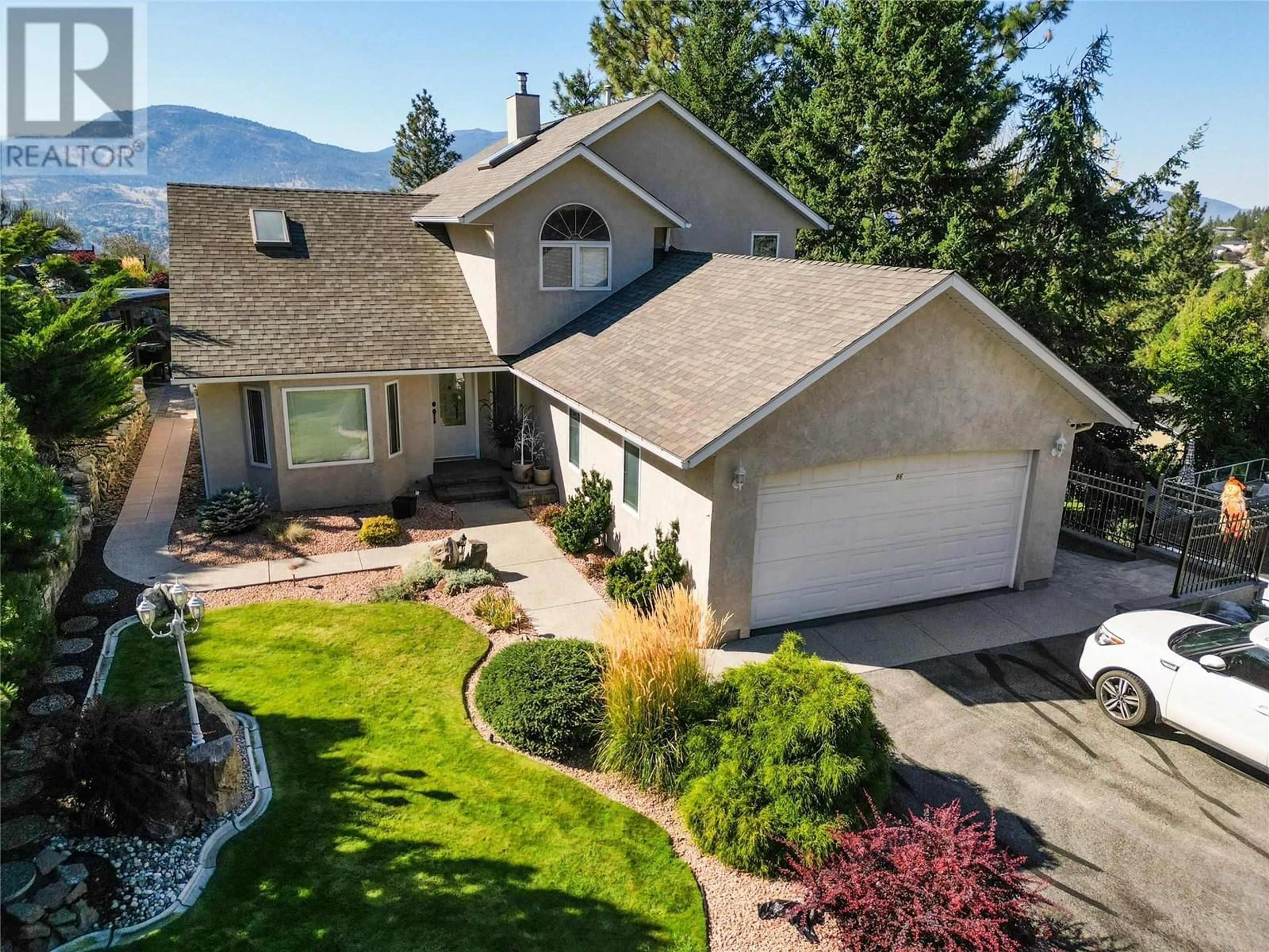A pic from outside/outdoor area/front of a property/back of a property/a pic from drone, mountain view for 286 ONE QUAIL PLACE, Okanagan Falls British Columbia V0H1R0