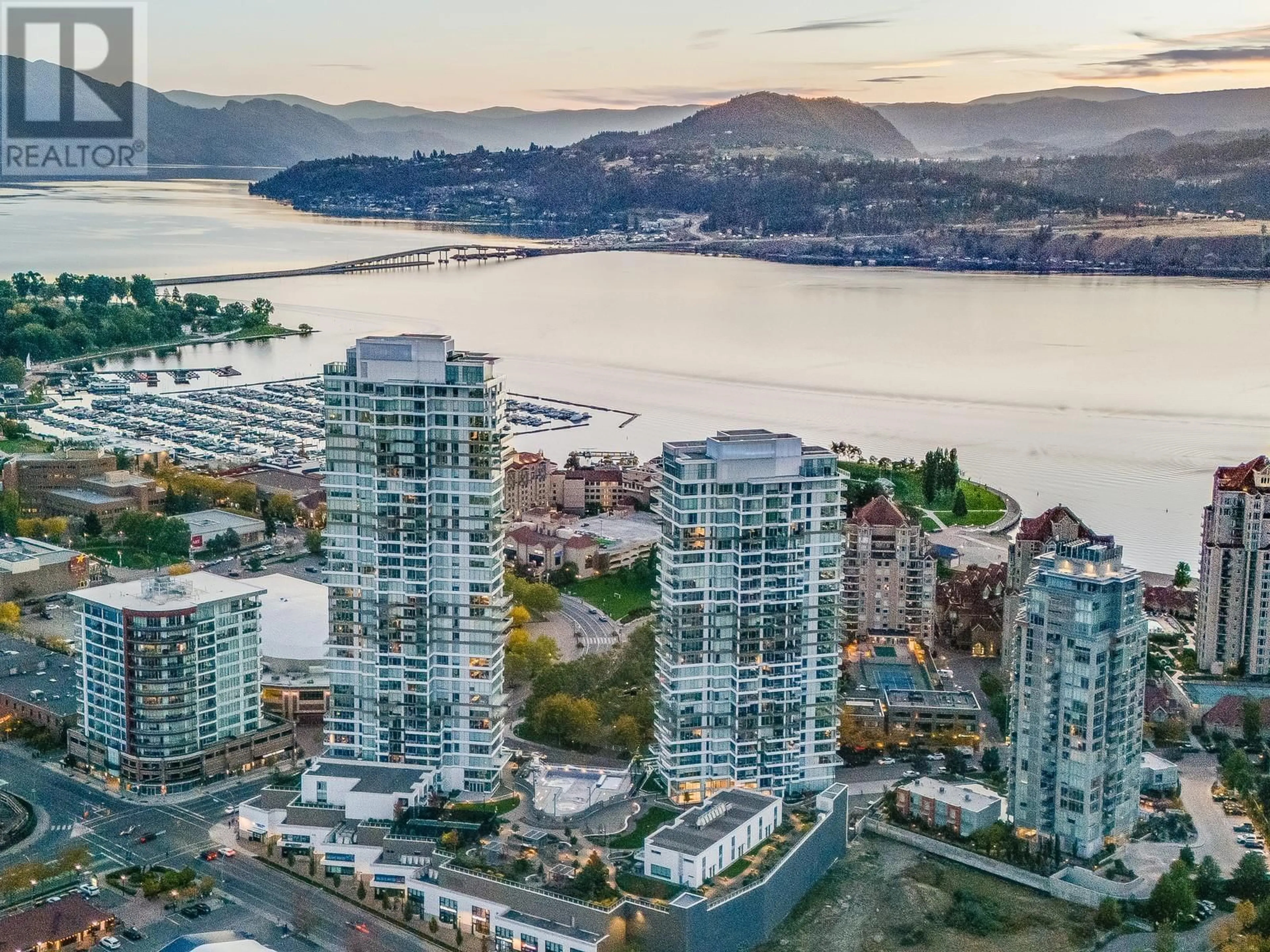 A pic from exterior of the house or condo, the view of city buildings for 1181 Sunset Drive Unit# 2502, Kelowna British Columbia V1Y0L4